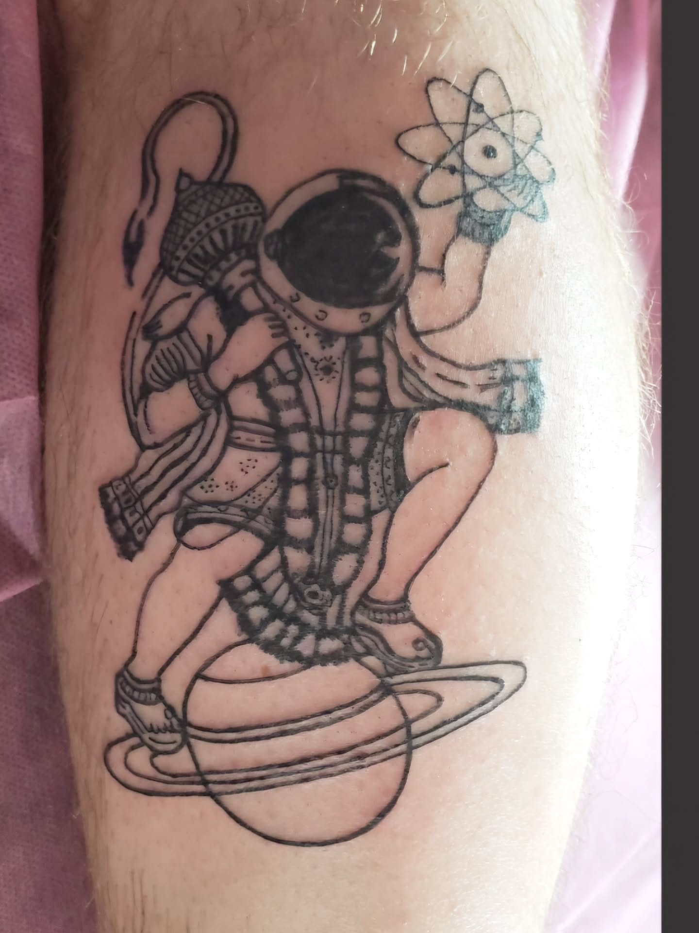 Astronaut with snake black and grey tattoo on the forearm by Ammy