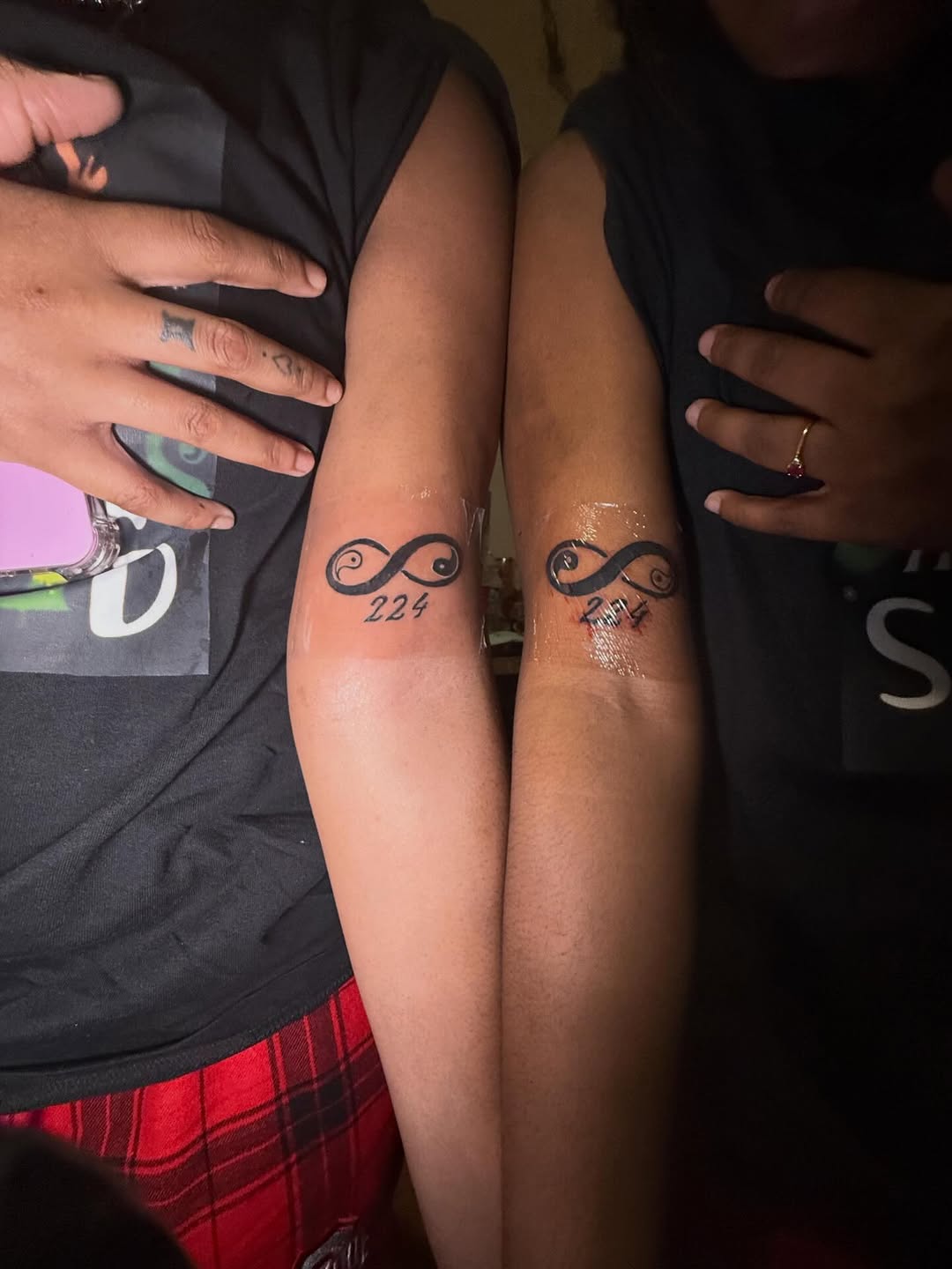 Infinity symbol with numbers tattoo on the forearm by Eunoia Tattoos