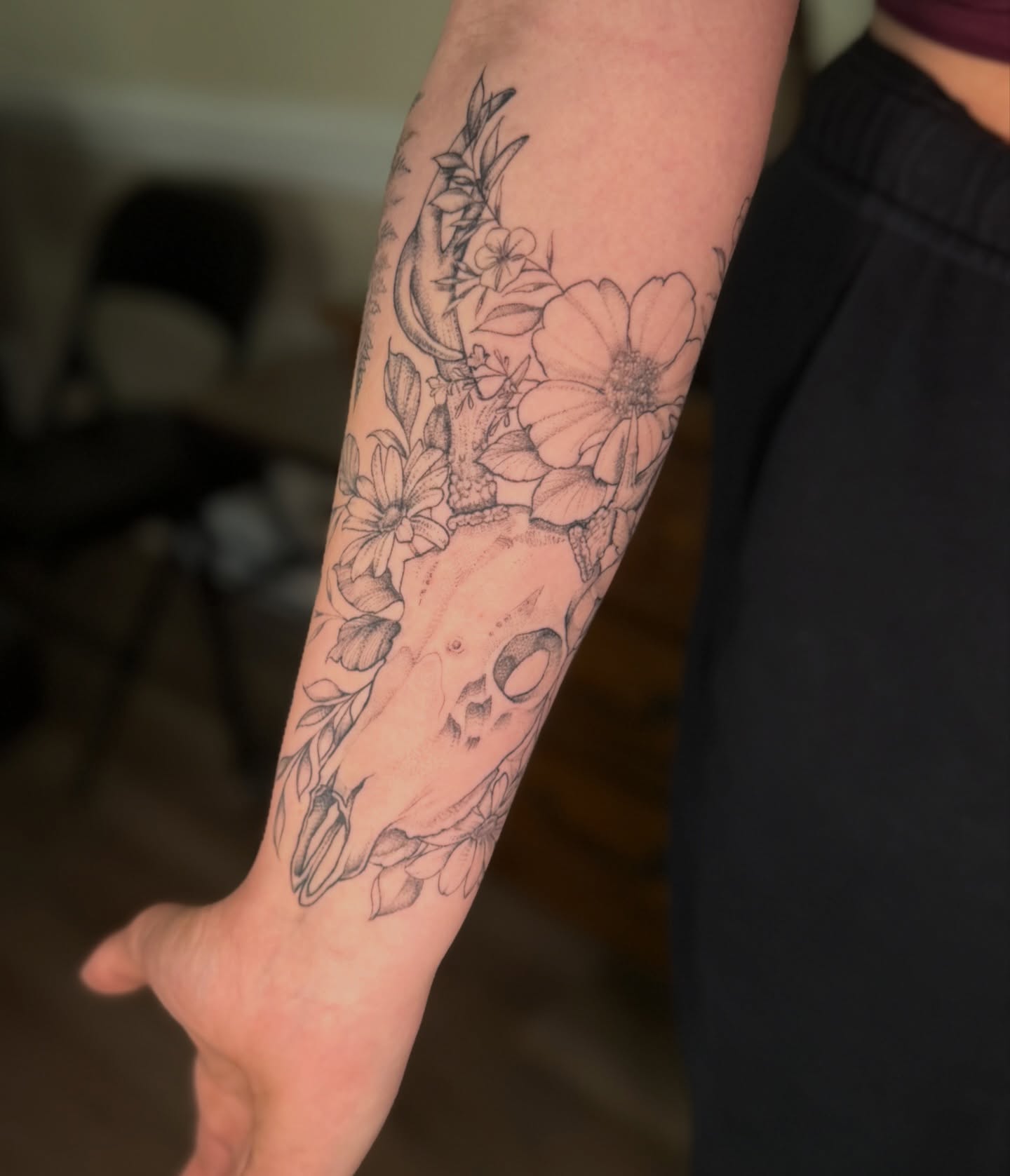 Flower skull black and grey tattoo on the forearm by Chiah