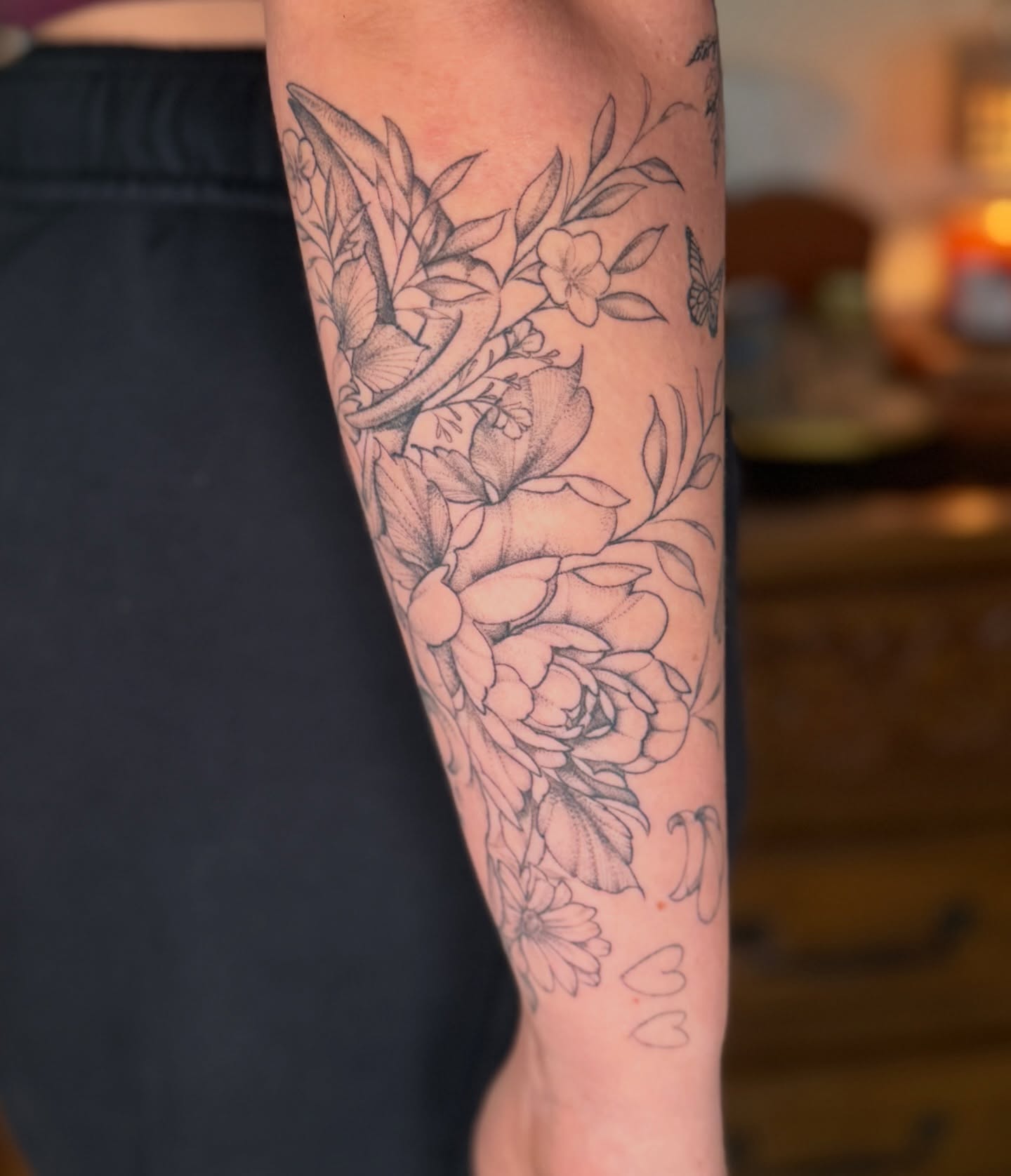 Floral bouquet black and grey tattoo on the forearm by Chiah