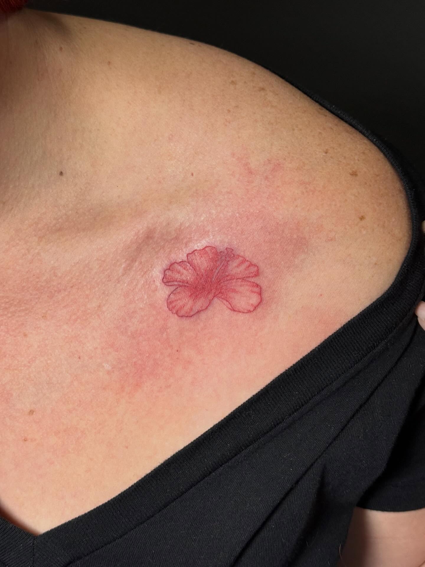 Flower dotwork tattoo on the shoulder by Camryn Justice