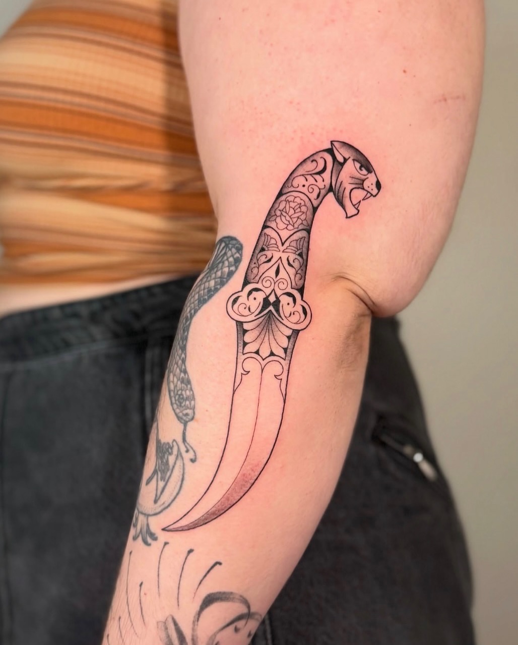 Katana black and grey tattoo on the forearm by Kail