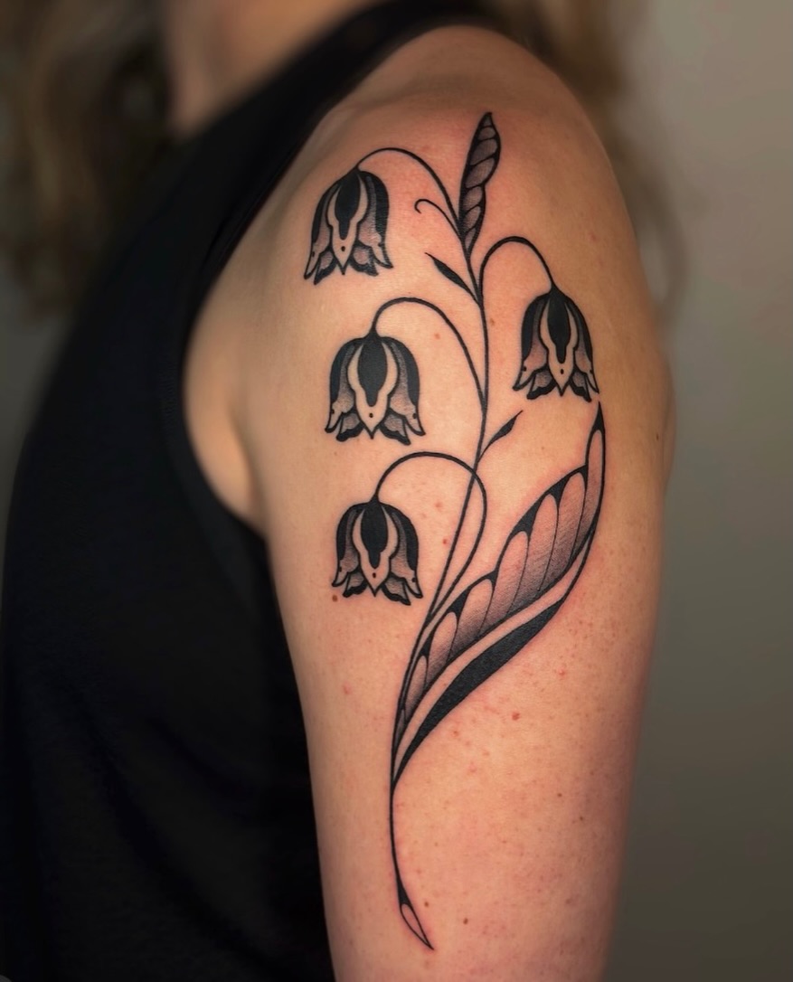 Bell flowers black and grey tattoo on the shoulder by Kail