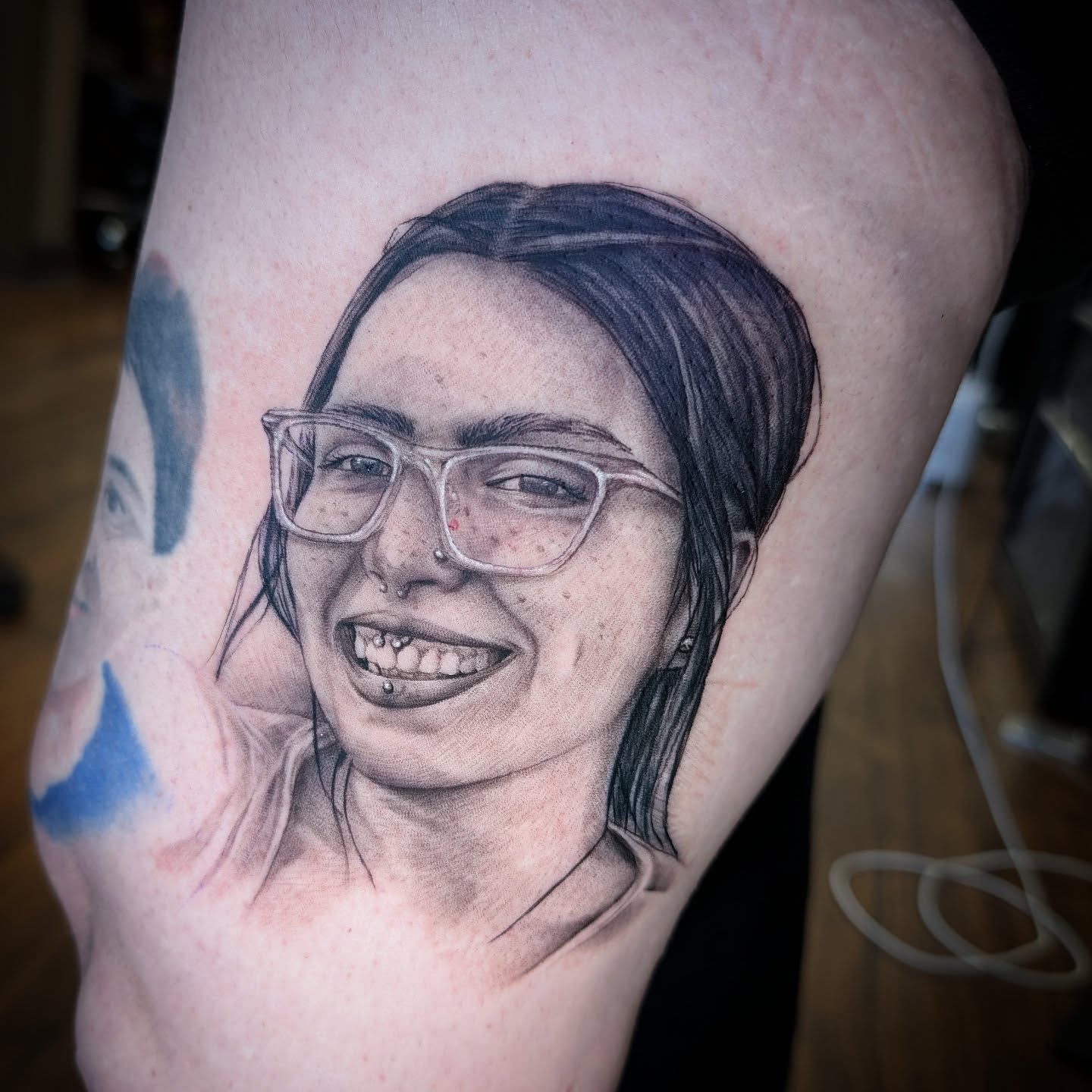 Portrait realism tattoo on the forearm by Will Alexander, Lombard, Illinois