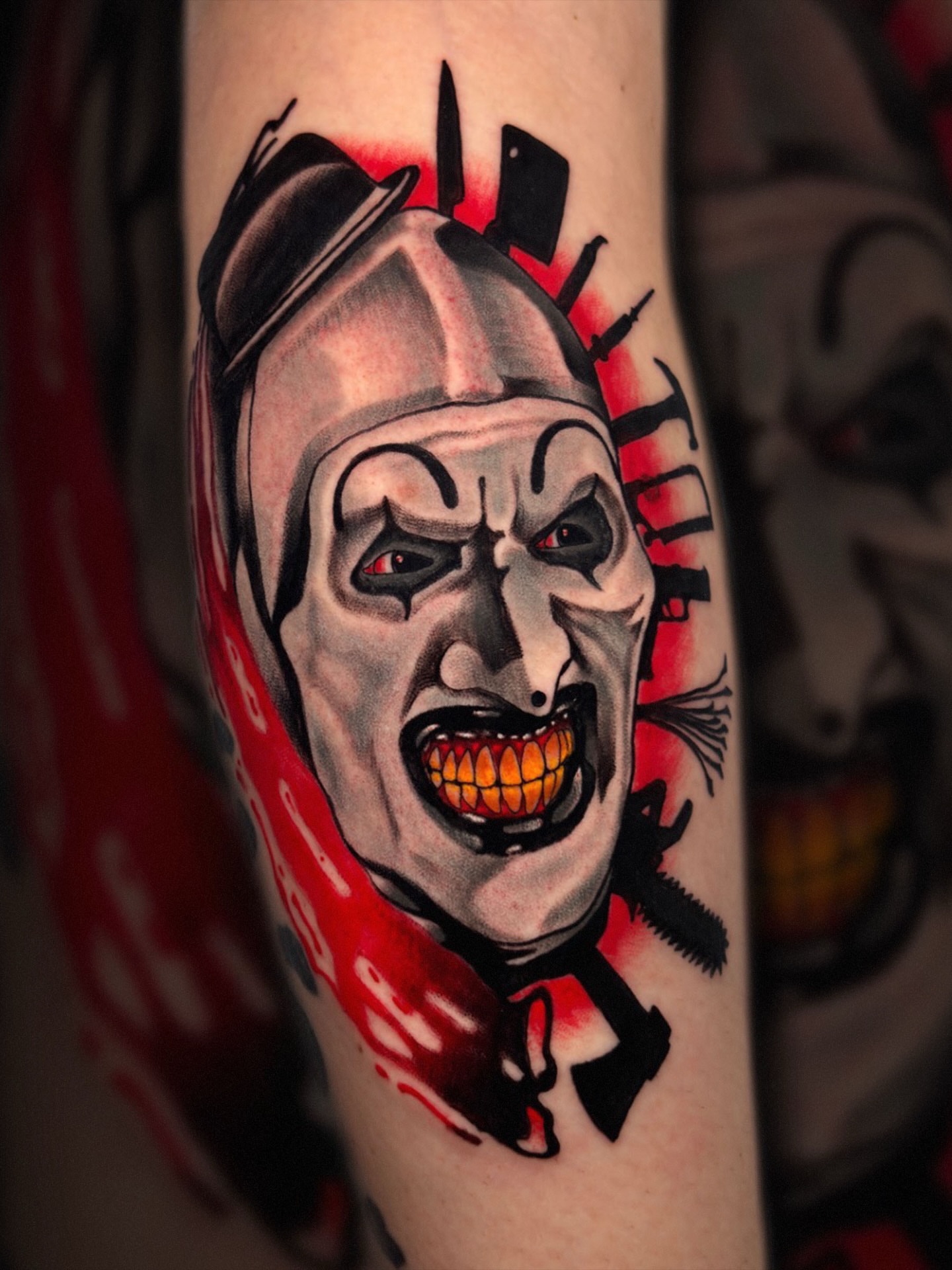 Clown American traditional tattoo on the forearm by Shane Klos