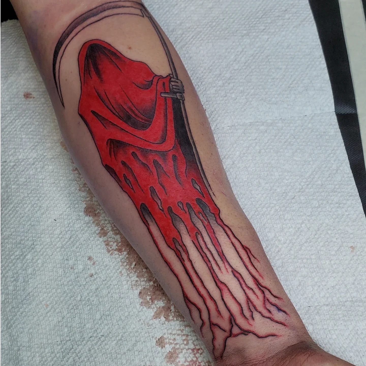 Red cape black and grey tattoo on the forearm by ✙ 𝐉𝐃 𝐒𝐩𝐫𝐨𝐮𝐥 ✙, Austin, Texas