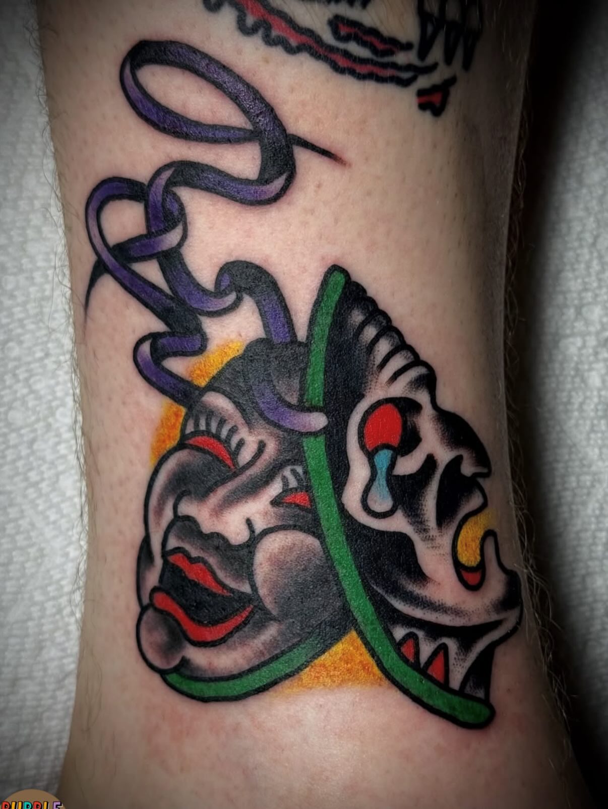 Demon heads American traditional tattoo on the forearm by Chuck Derek Whitaker