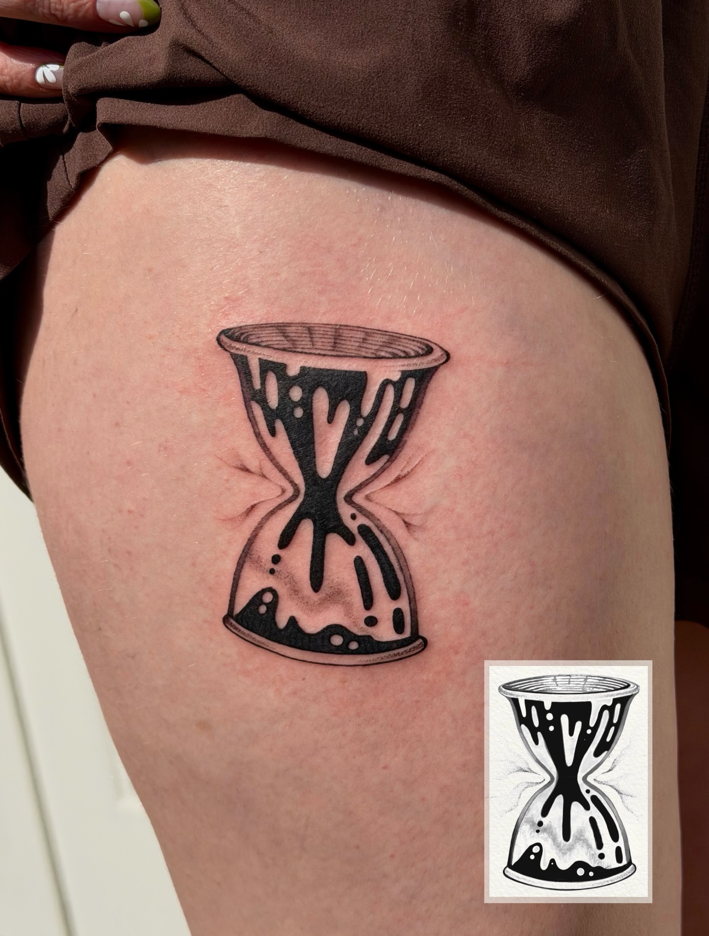 Hourglass black and grey tattoo on the thigh by Kingtide Ink