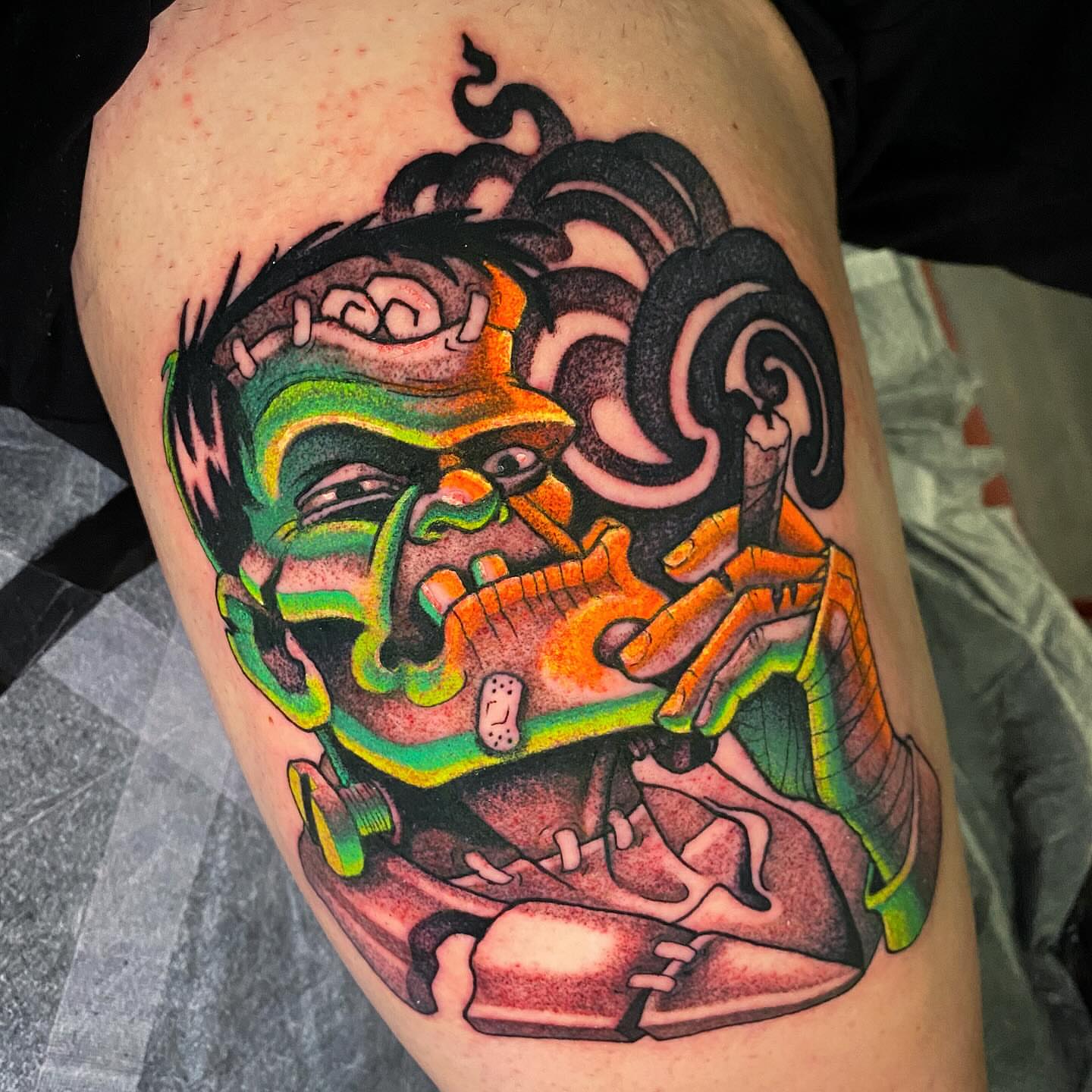 Frankenstein new school tattoo on the thigh by Lindsay Hall