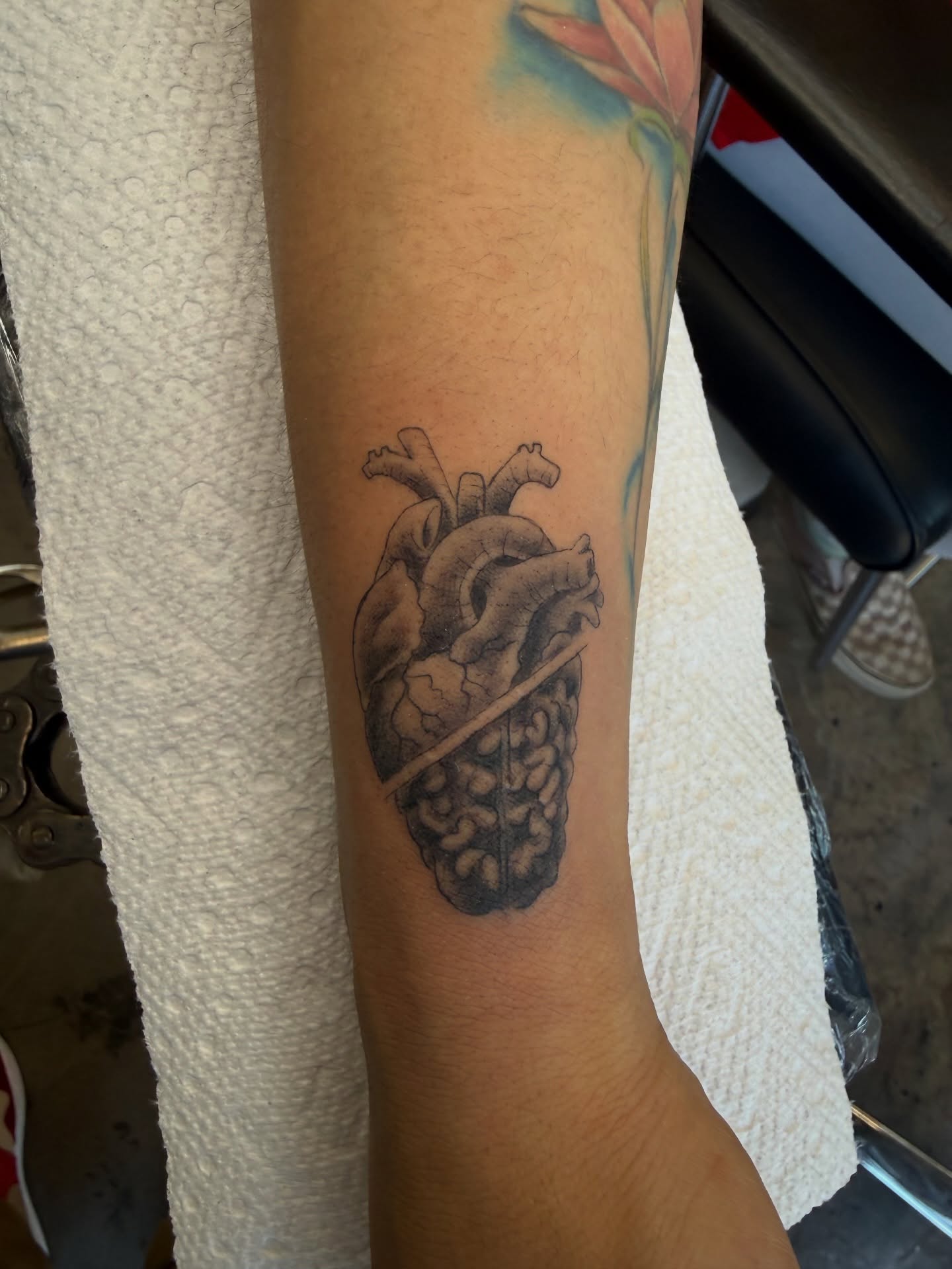 Anatomical heart black and grey tattoo on the forearm by Ricky Sanchez, Duncanville, Texas