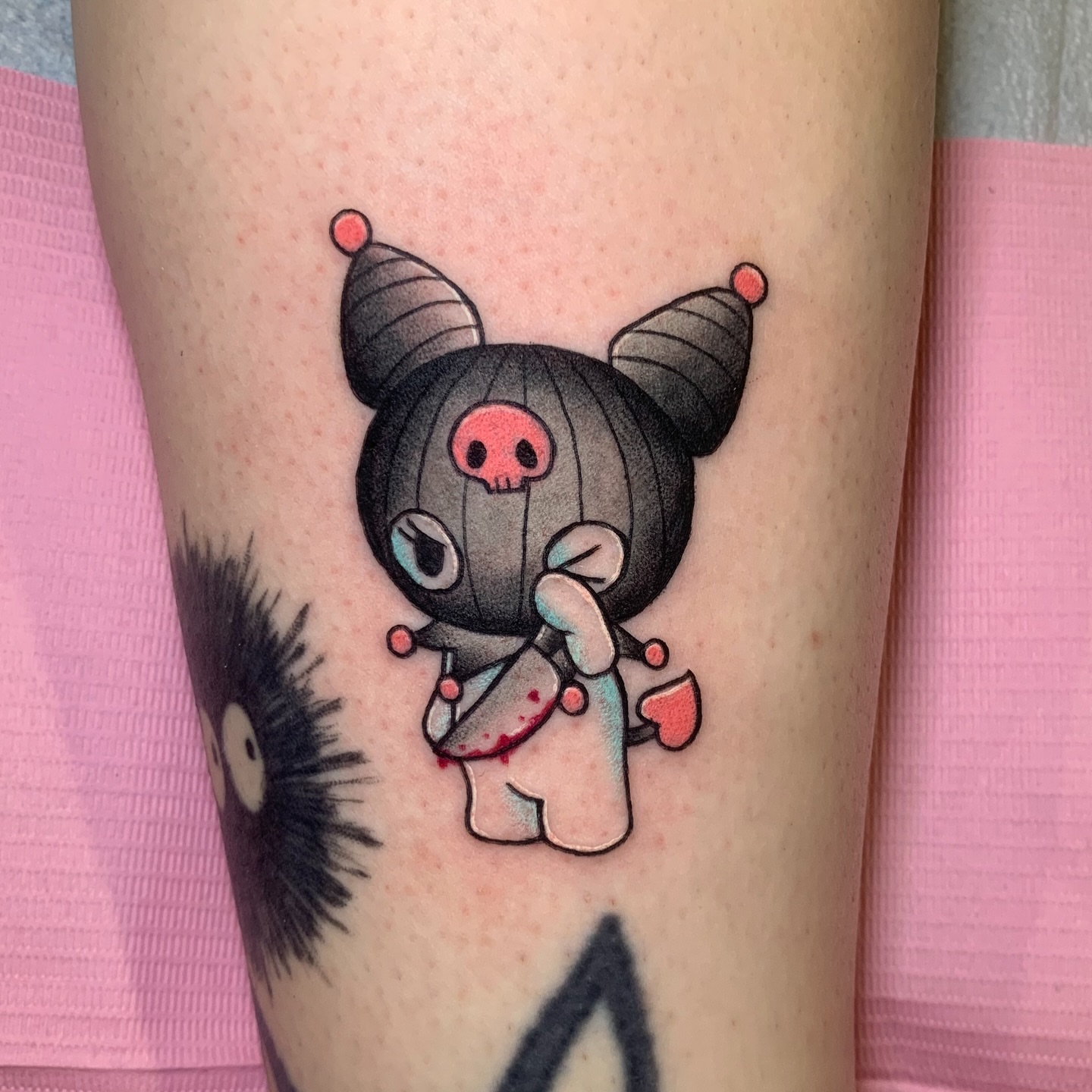 Kawaii demon dotwork tattoo on the forearm by Aubrianna Grisez