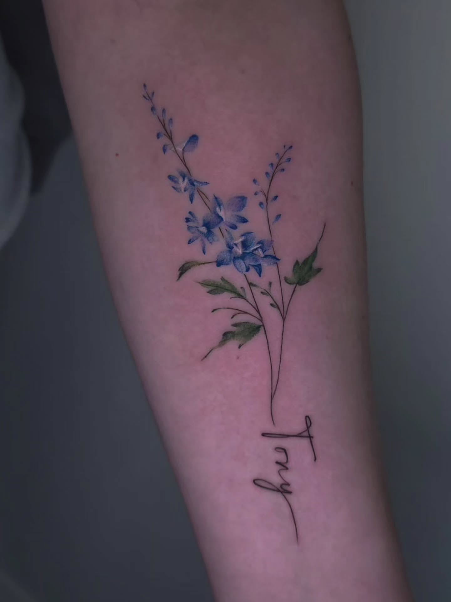 Blue flowers watercolor tattoo on the forearm by Viktoriia ▪︎ Tattoo ▪︎ Chicago ▪︎ Naperville