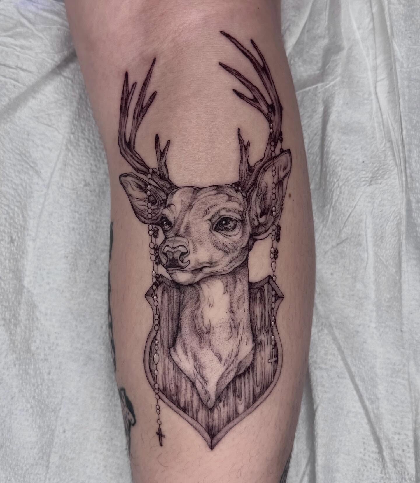 Deer head realism tattoo on the forearm by taline
