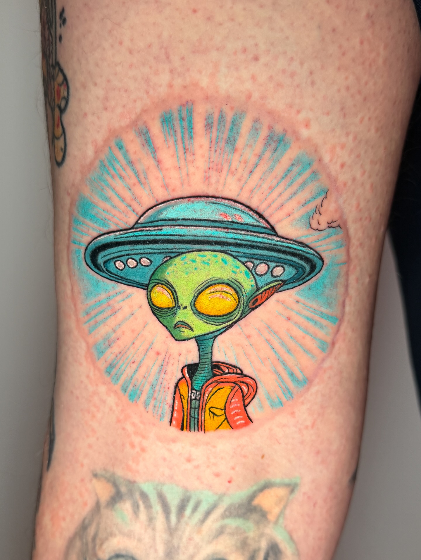 Alien with UFO new school tattoo on the forearm by Tattoo Artist Los Angeles