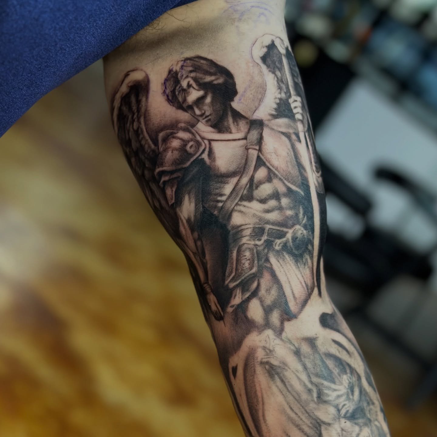 Angelic warrior realism tattoo on the forearm by Trent Hebert