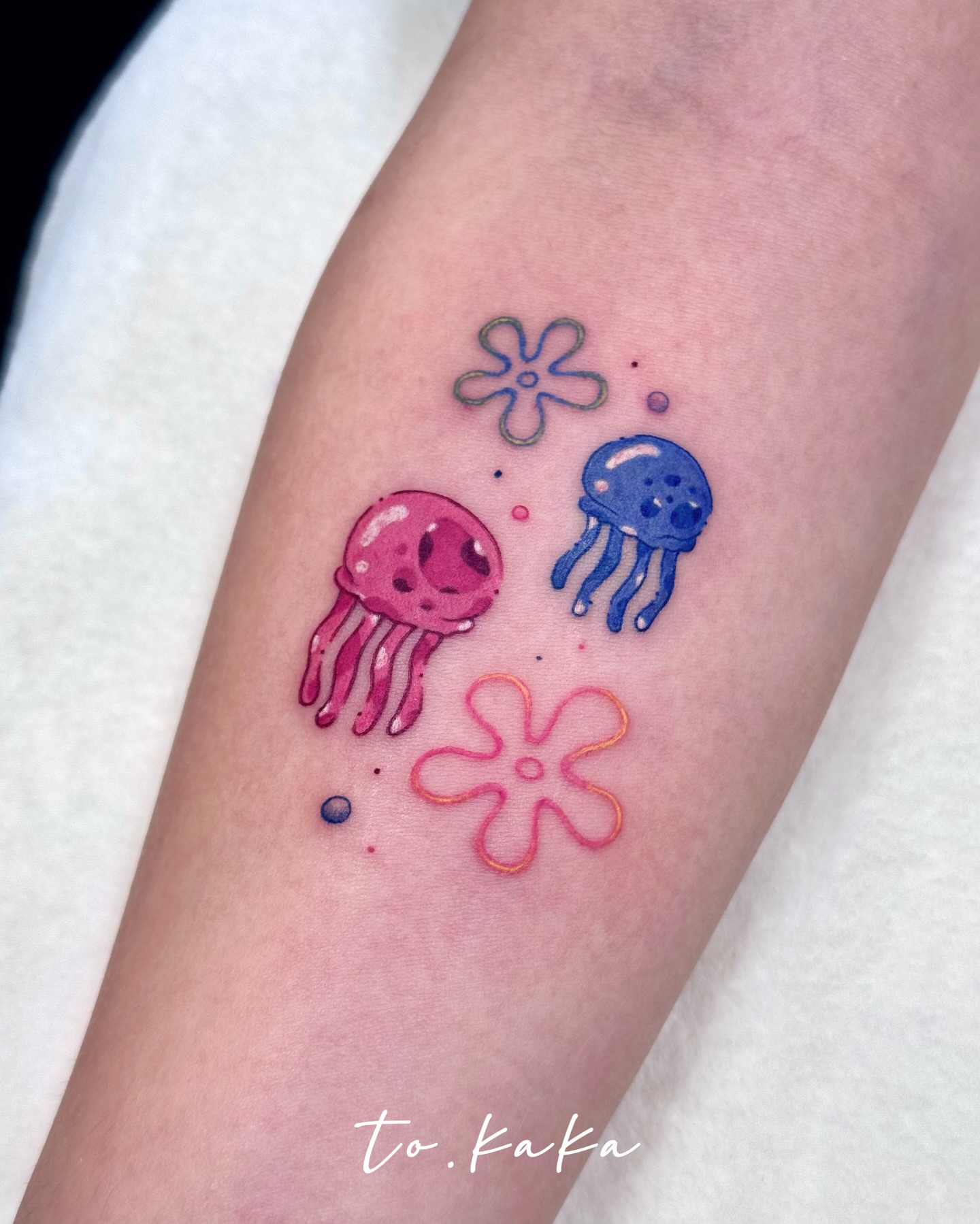 Tattoo by @to.kaka_tattoo — dotwork, watercolor