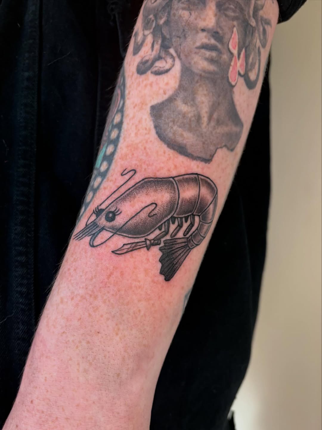 Shrimp fine line tattoo on the forearm by Fin :