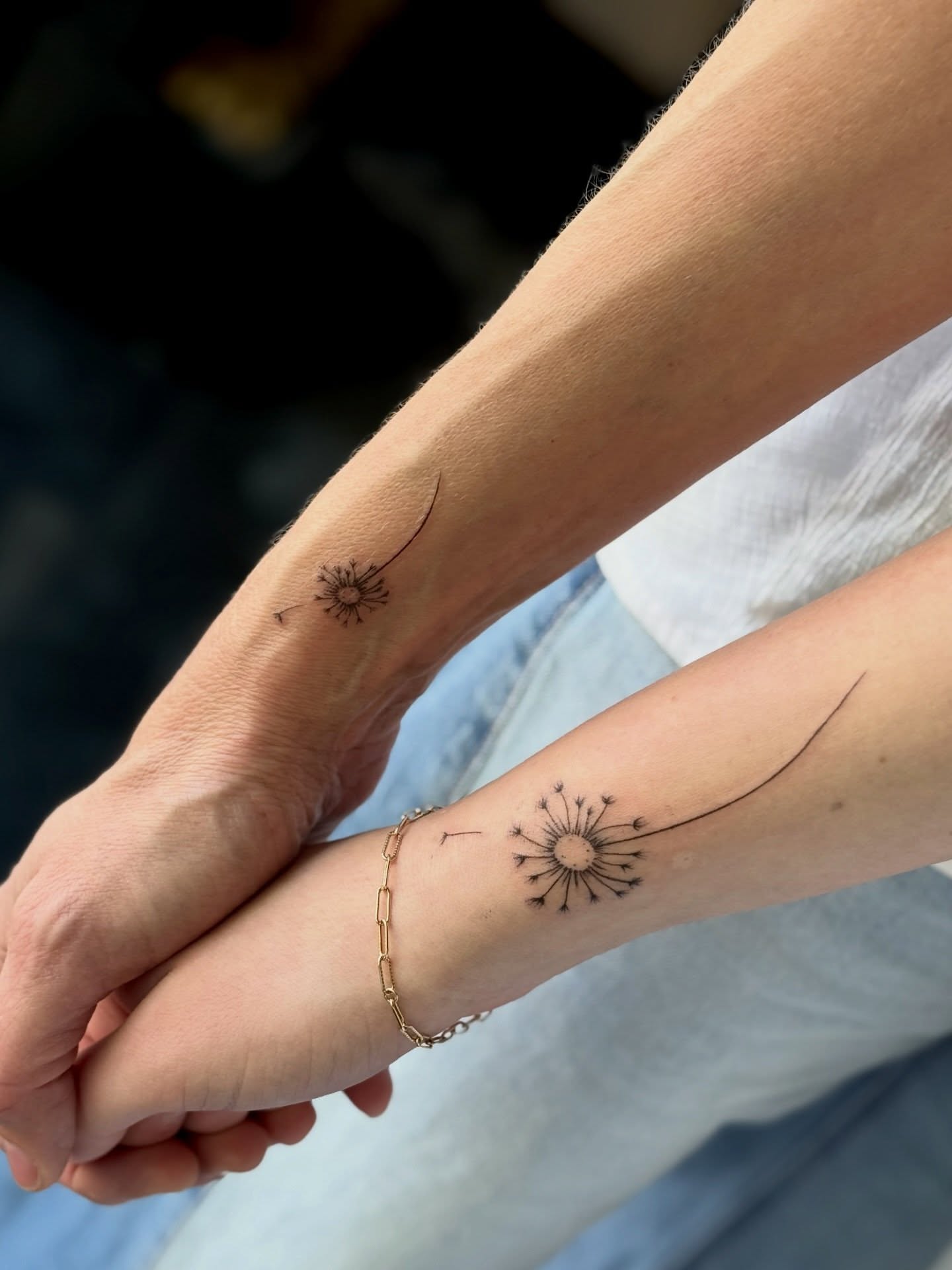 Dandelion dotwork tattoo on the forearm by Emily Velletta, Huntersville, North Carolina