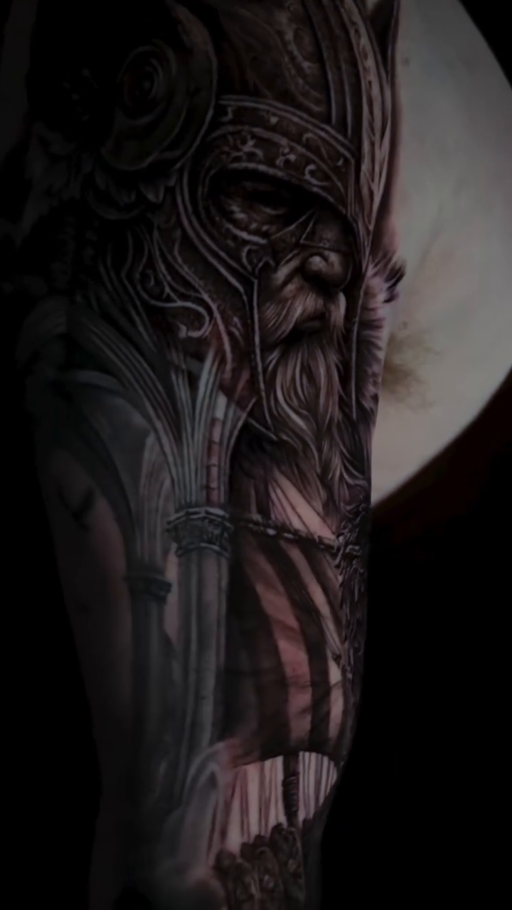 Viking warrior and ship realism tattoo by Michael Getz