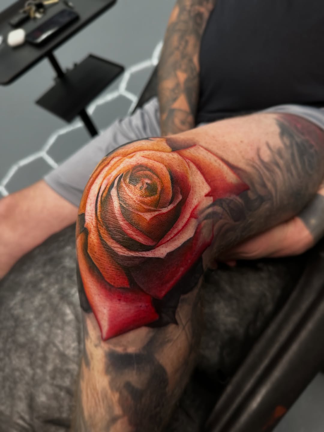 Rose neo-traditional tattoo on the forearm by Dakota Case