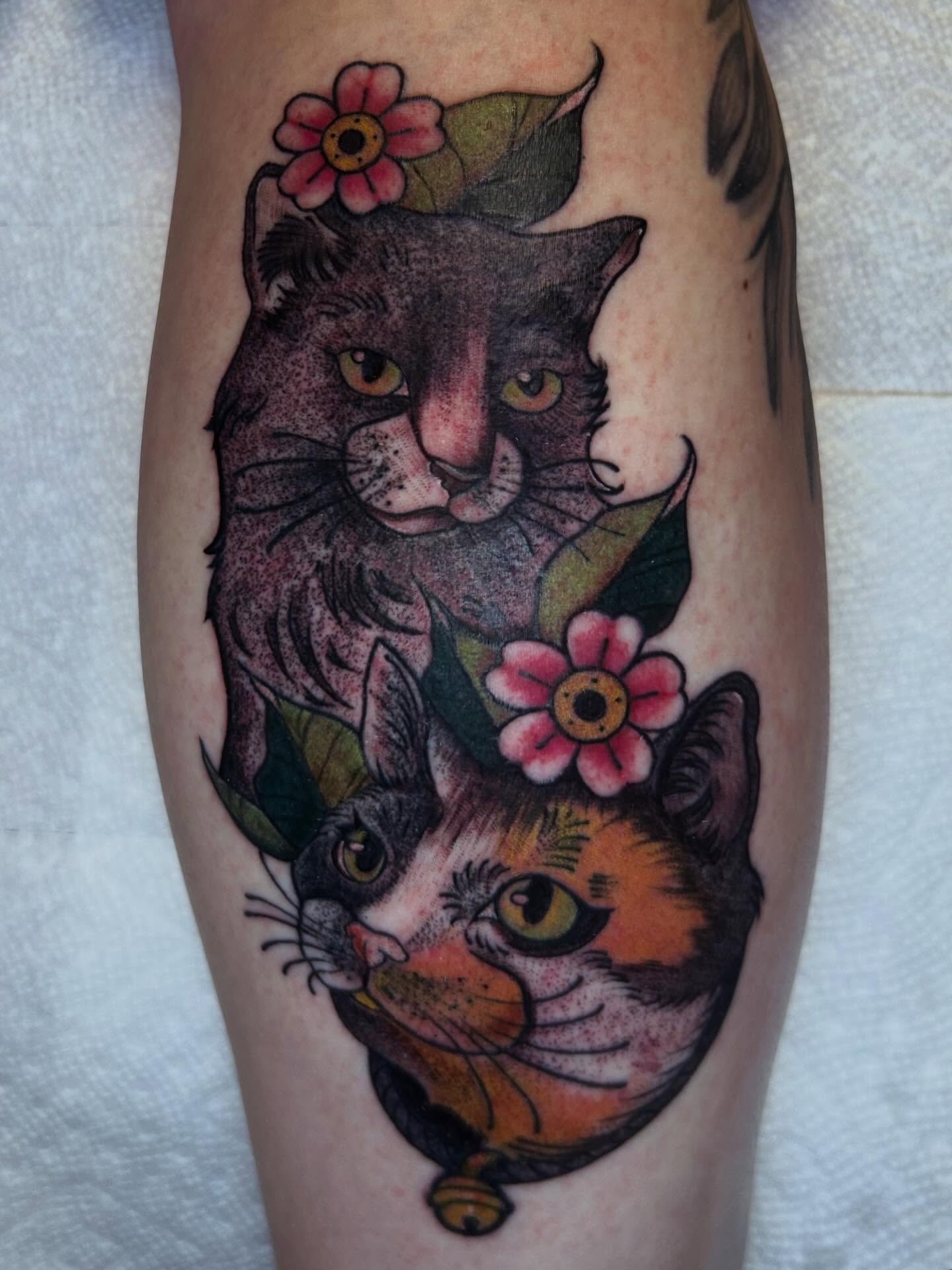 Cats and flowers American traditional tattoo on the forearm by Ashley Lambert