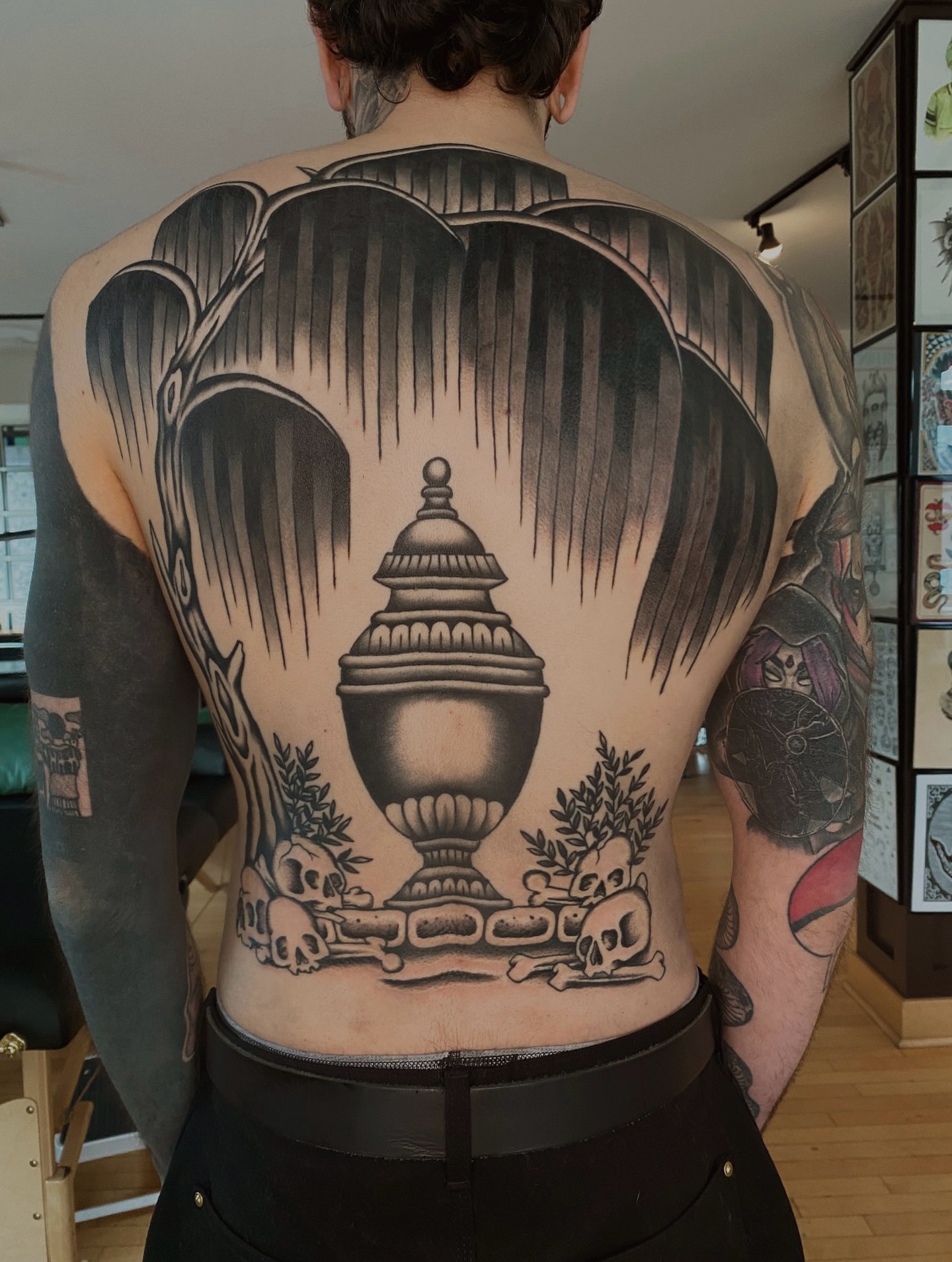 Urn and skulls black and grey tattoo on the back by Will Allan Columbus tattoo artist