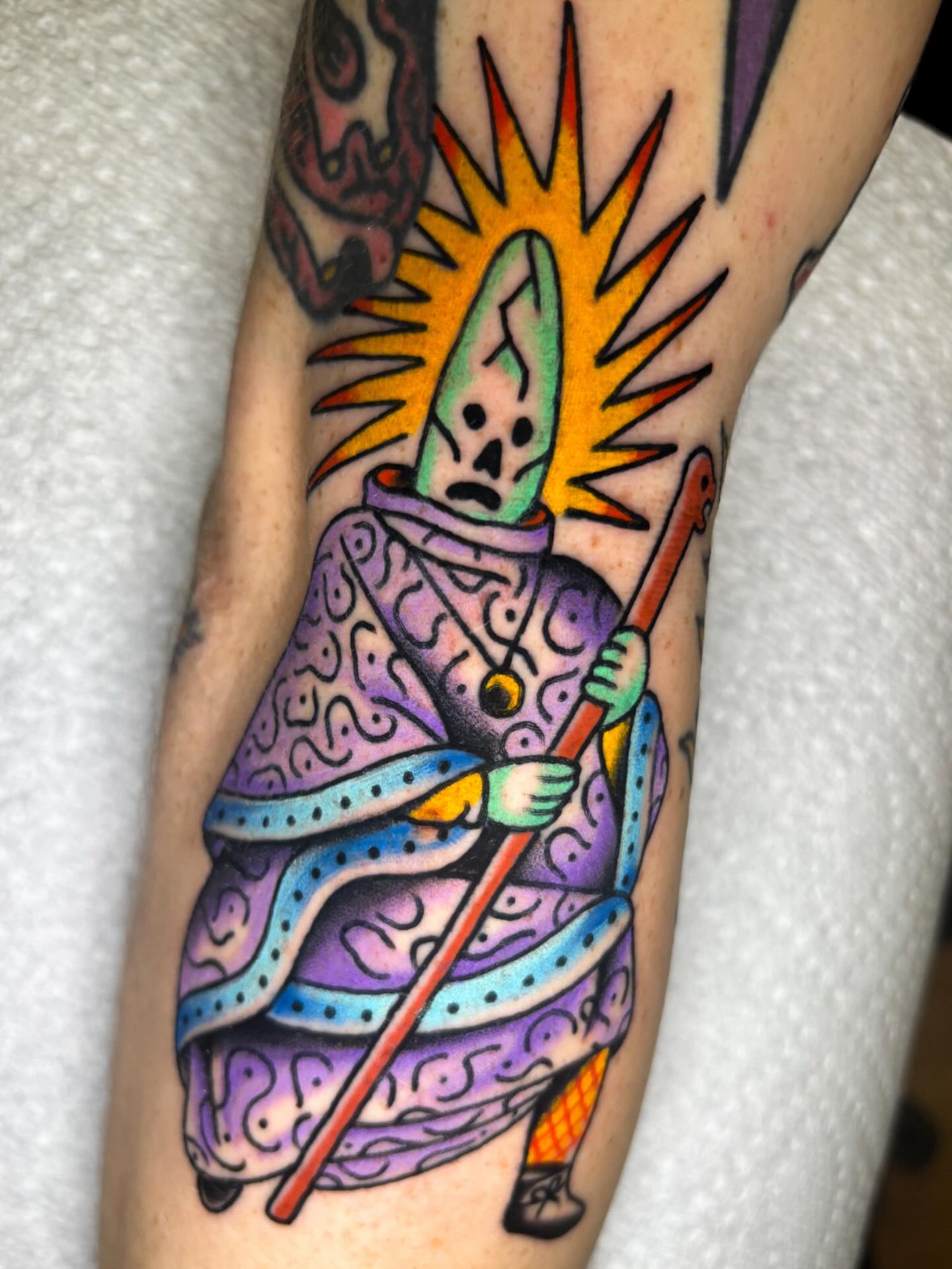 Rick and morty character American traditional tattoo on the forearm by Katelyn Spence