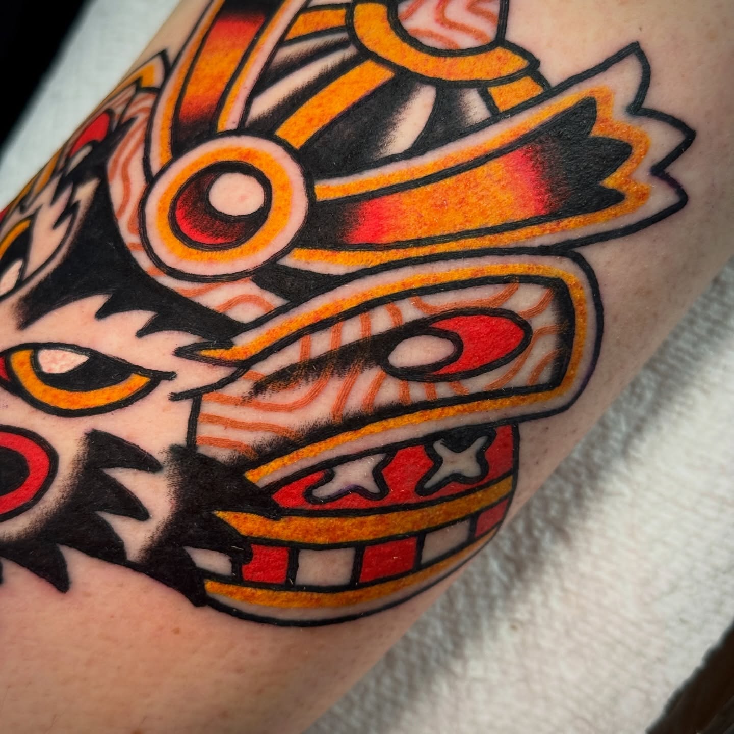 Mask American traditional tattoo on the forearm by Rafael Torres, San Francisco, California