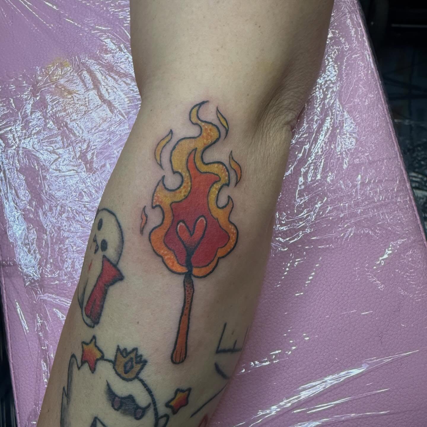 Flame torch new school tattoo on the forearm by Bry