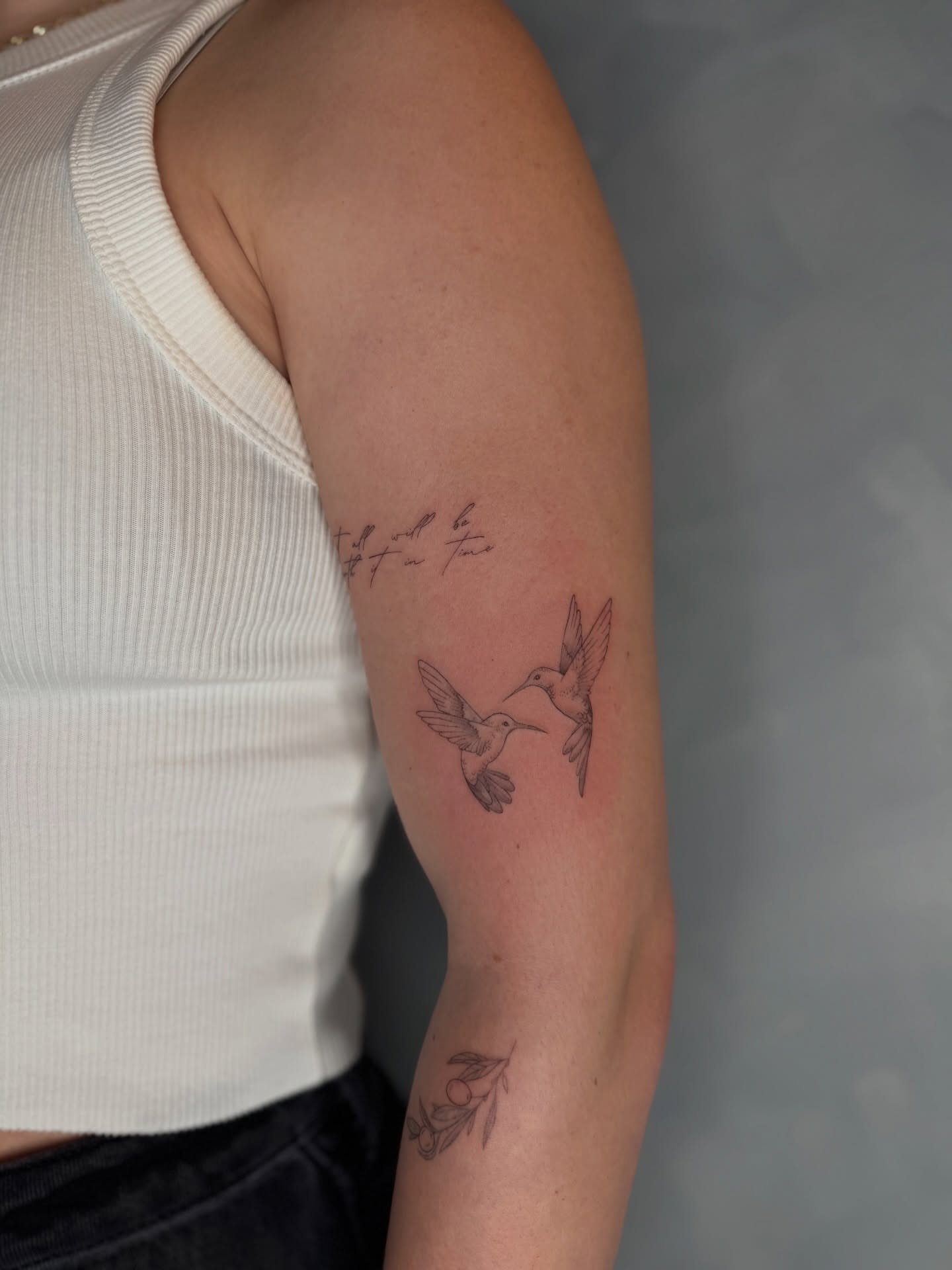 Hummingbirds fine line tattoo on the forearm by Fineline Tattoos DFW