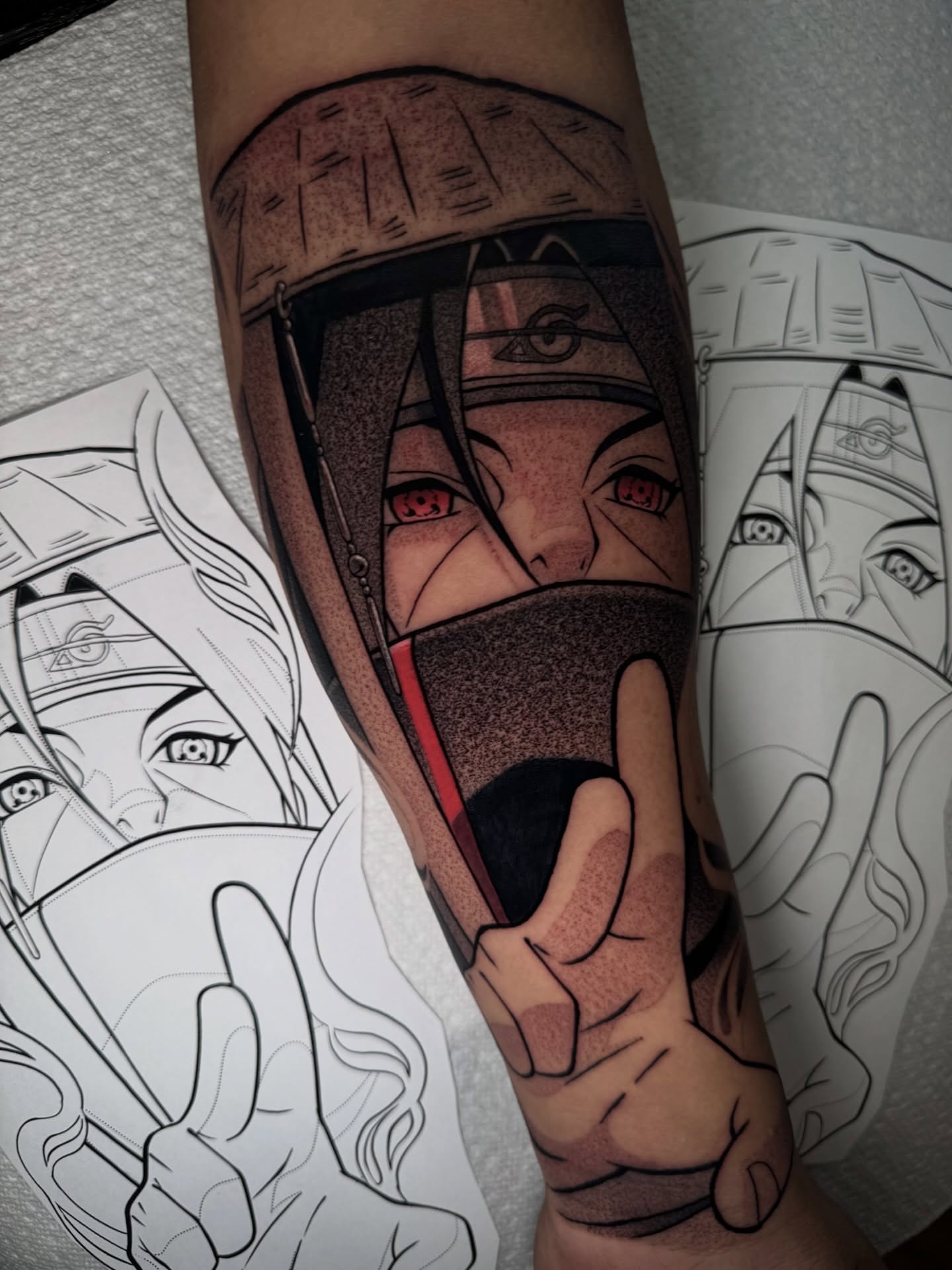 Anime character anime tattoo on the forearm by Anthony D. Rustik