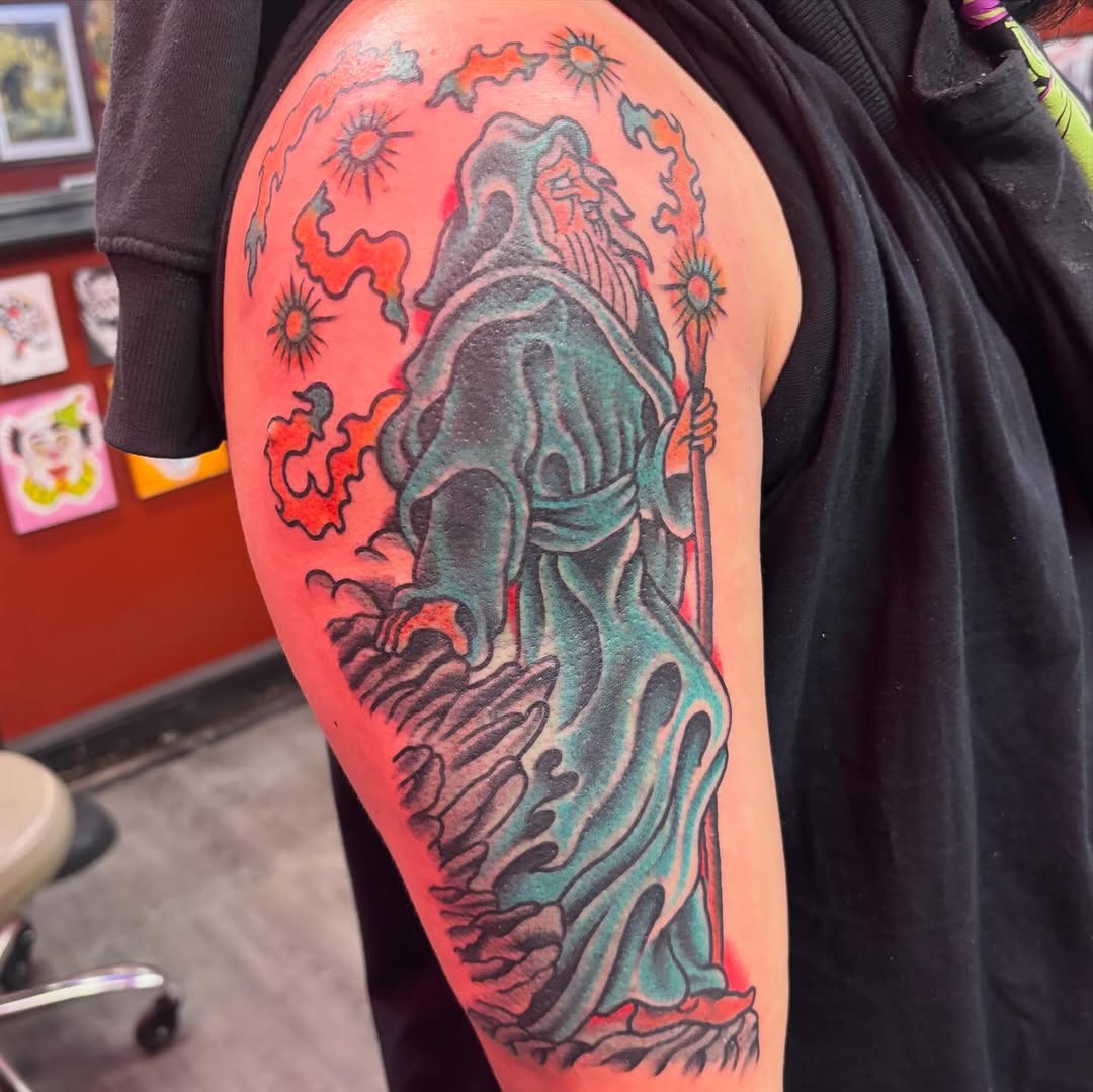 Wizard with staff Japanese tattoo on the upper arm by @dannydoestattoos