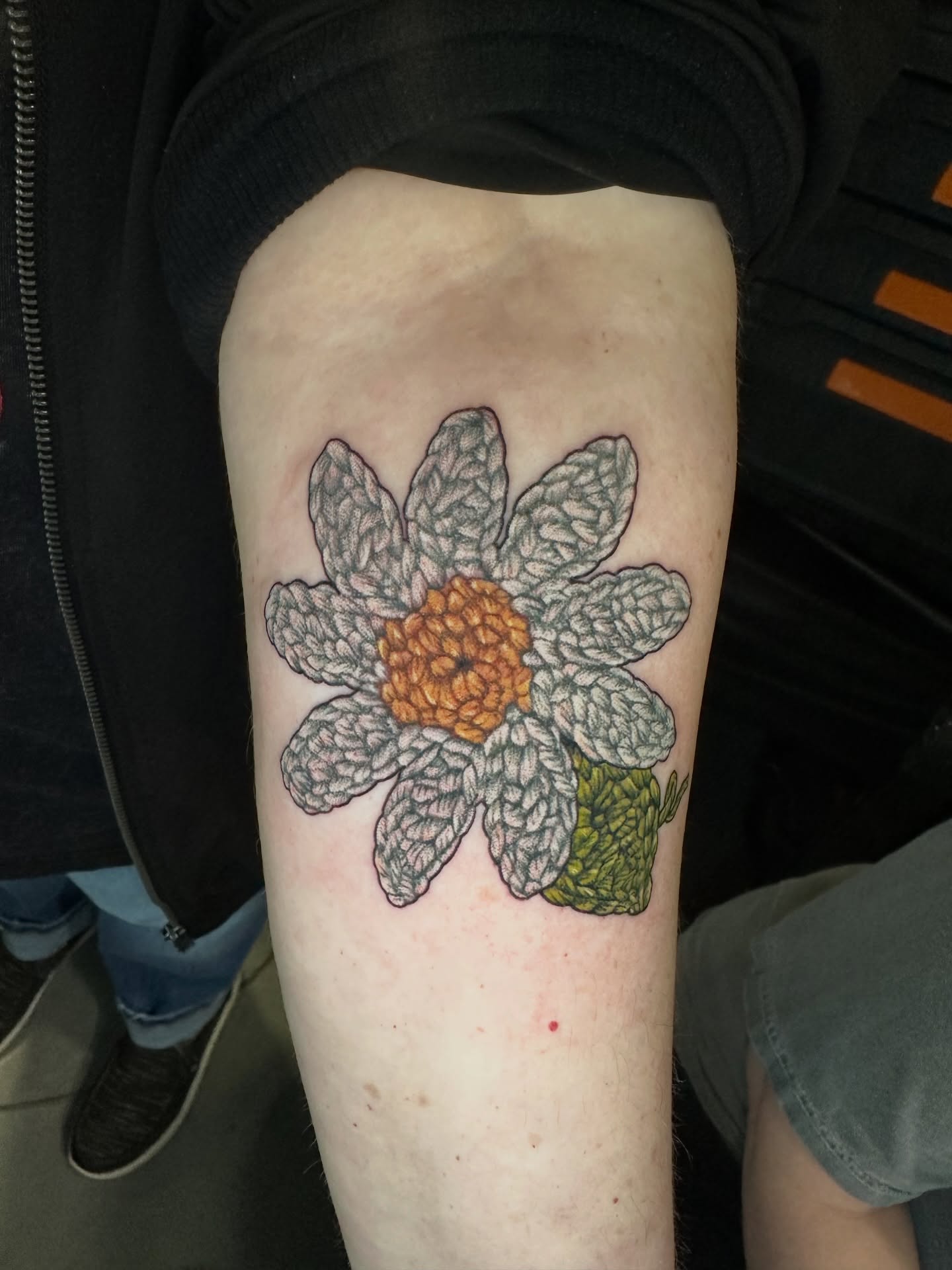 Knitted flower tattoo on the forearm by (Joshua) Van Cummings