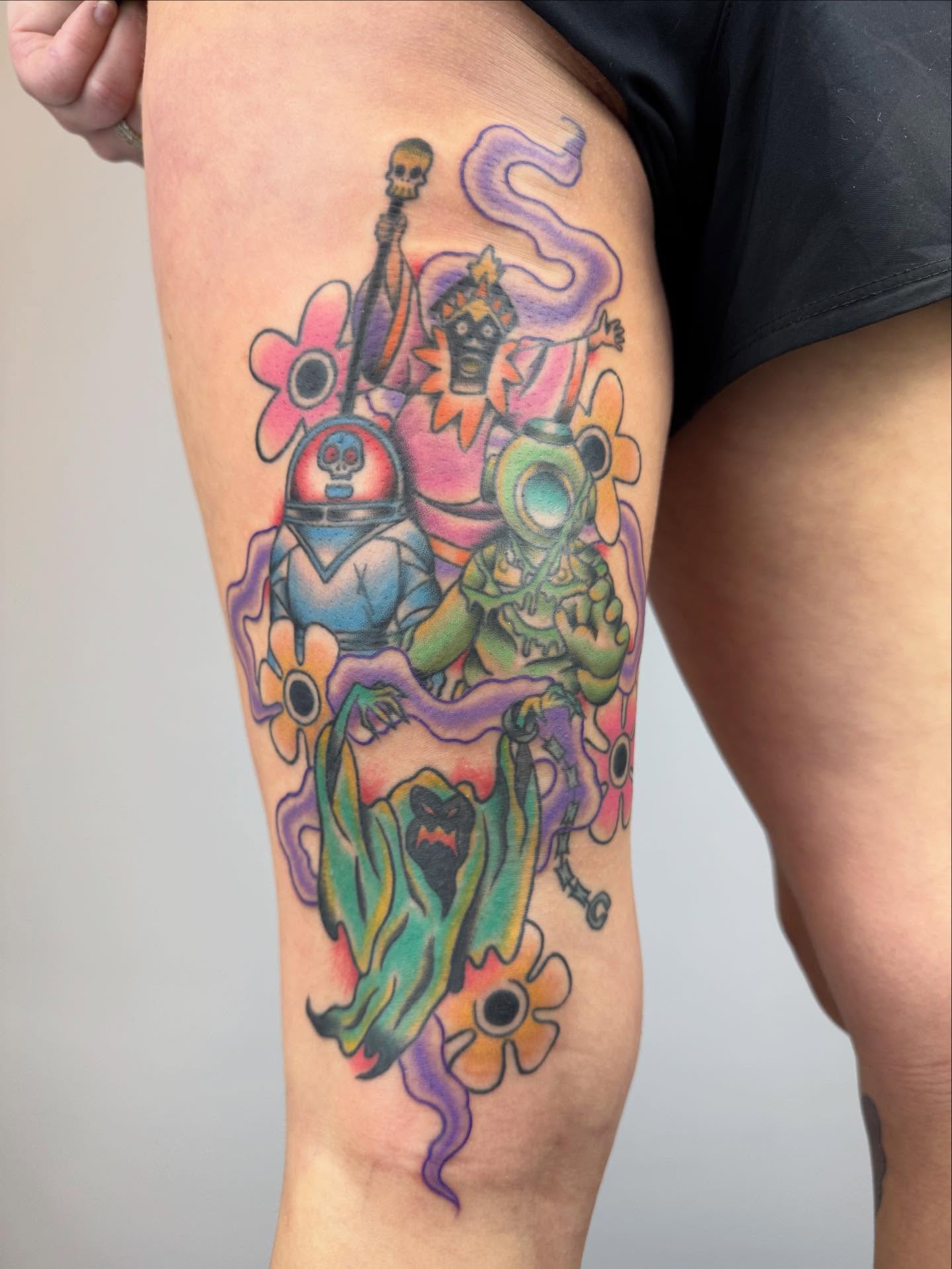 Surrealistic characters and flowers surrealism tattoo on the thigh by π©πͺπ¬
