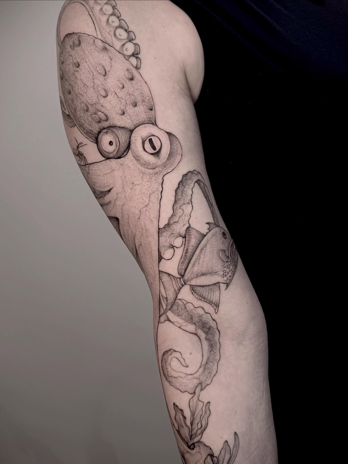 Octopus and fish dotwork tattoo on the forearm by Tattoos by Robyn Pallotta, Austin, Texas