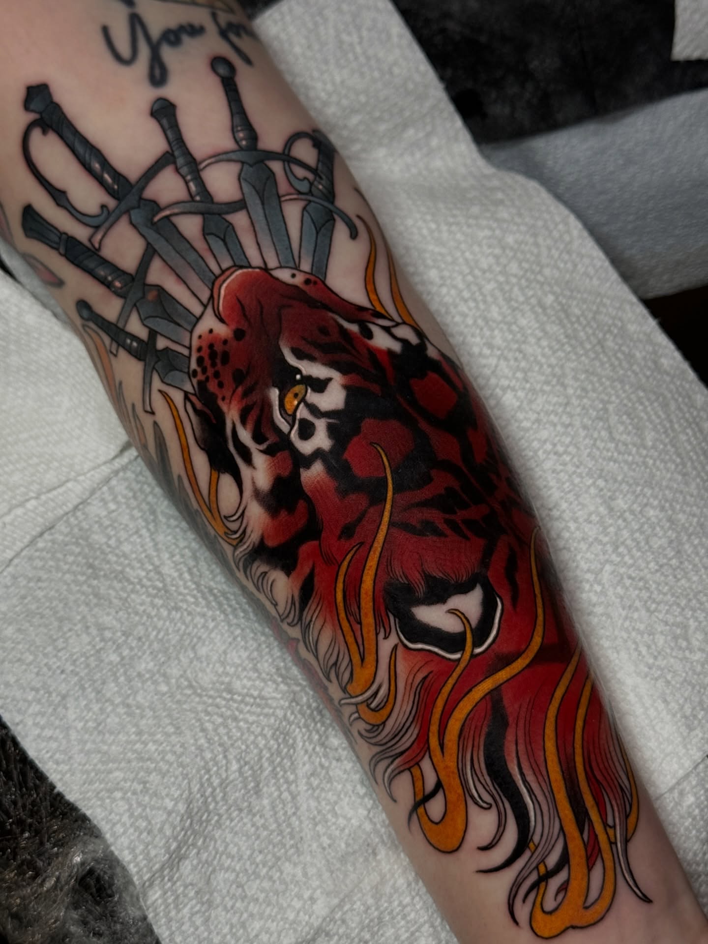 Flaming heart American traditional tattoo on the forearm by πππ±π±π¬π¬ ππ―π±π¦π°π±