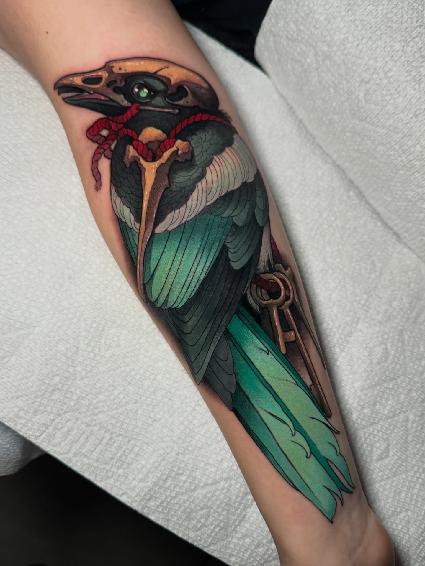 Bird with key realism tattoo on the forearm by πππ±π±π¬π¬ ππ―π±π¦π°π±