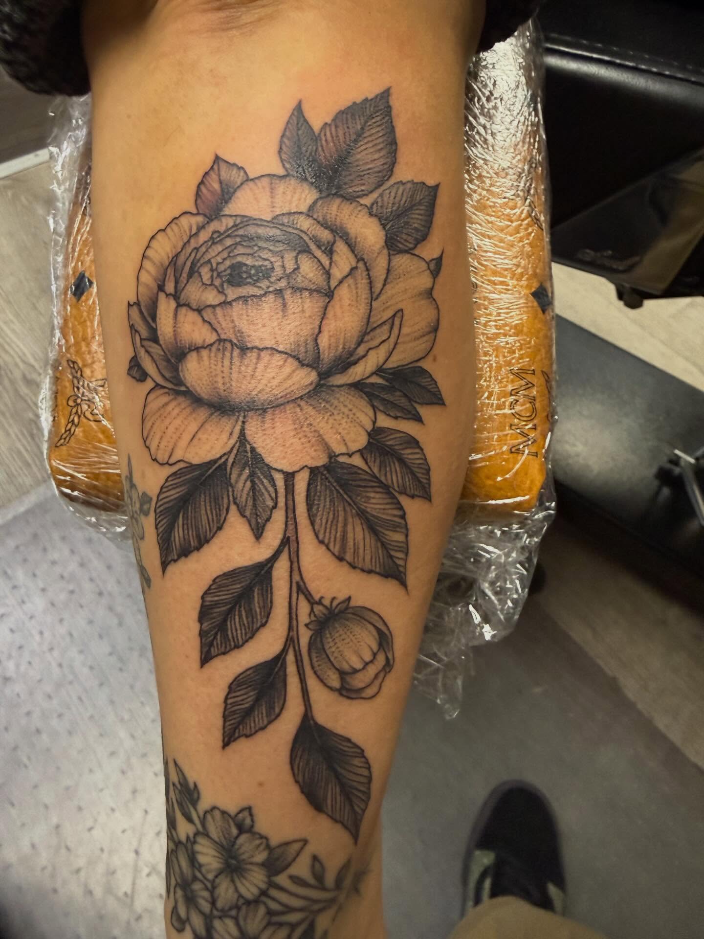 Peony black and grey tattoo on the forearm by Matthew Humphrey, Pawcatuck, Connecticut