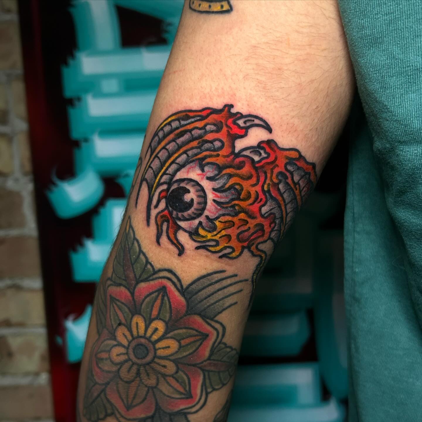 Koi fish American traditional tattoo on the forearm by Alycia