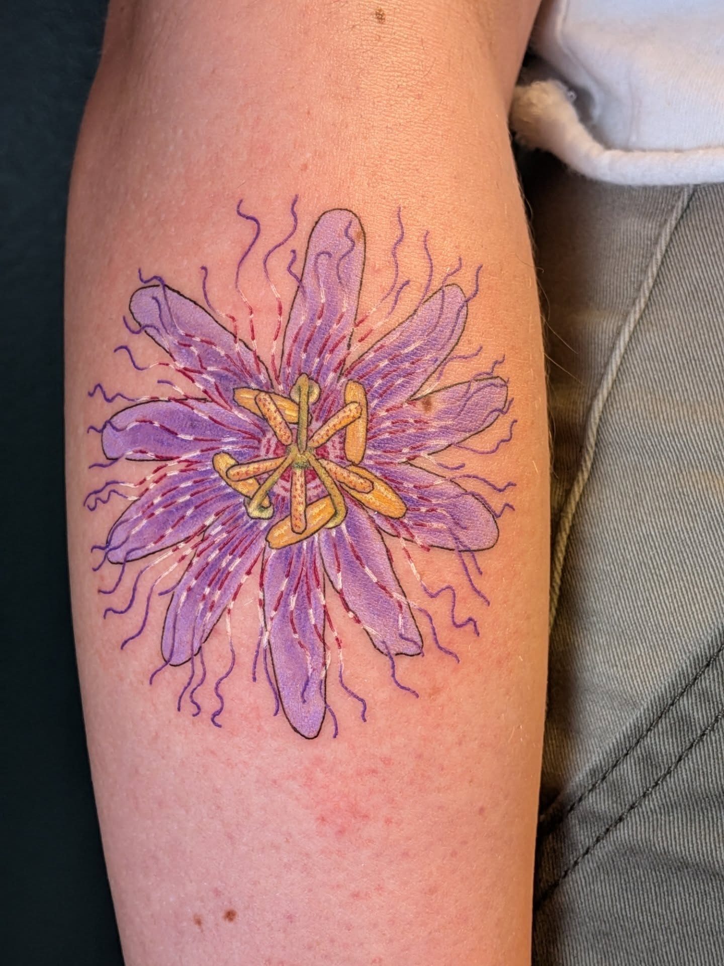 Passion flower realism tattoo on the forearm by L U C y, Knoxville, Tennessee