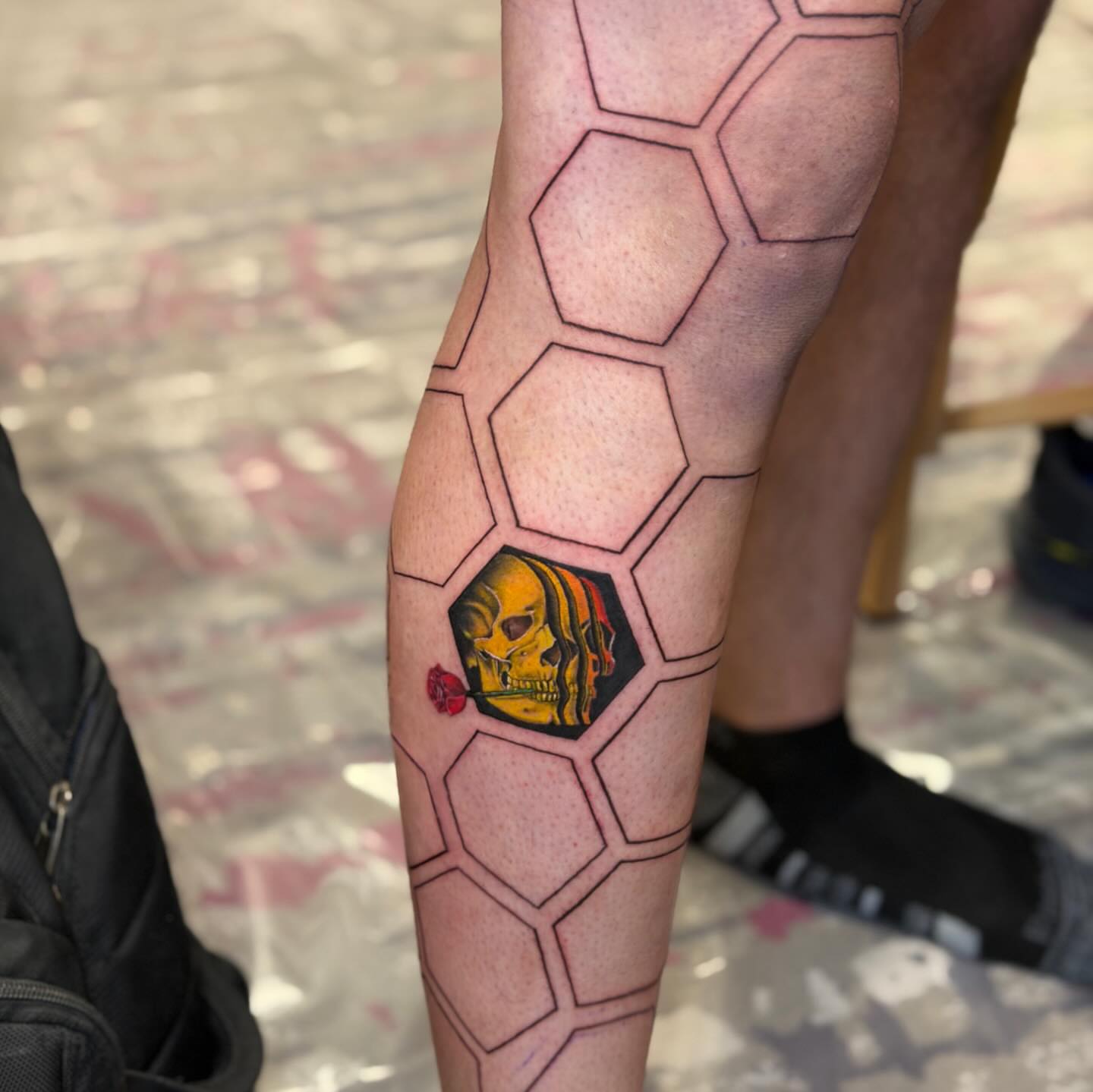 Geometric hexagon with skull geometric tattoo on the forearm by Marquis Neal