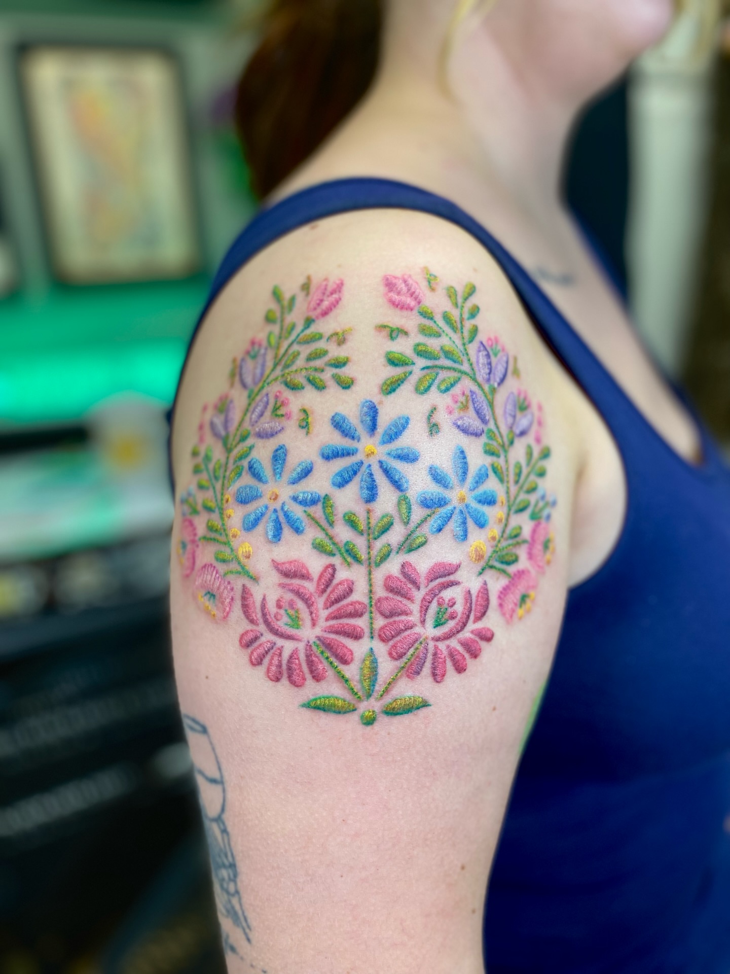 Floral mandala dotwork tattoo on the shoulder by Loki Shane DeFriece
