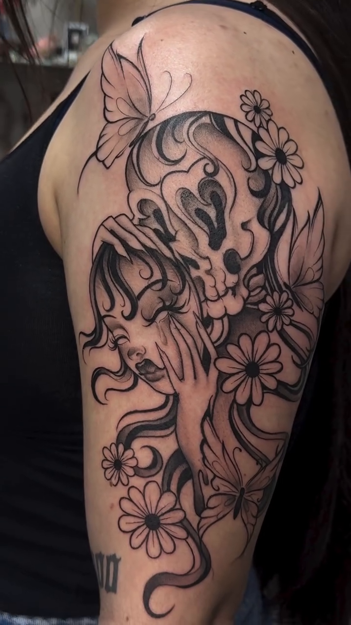 Woman with skull and flowers realism tattoo by Mo Dinero🎰