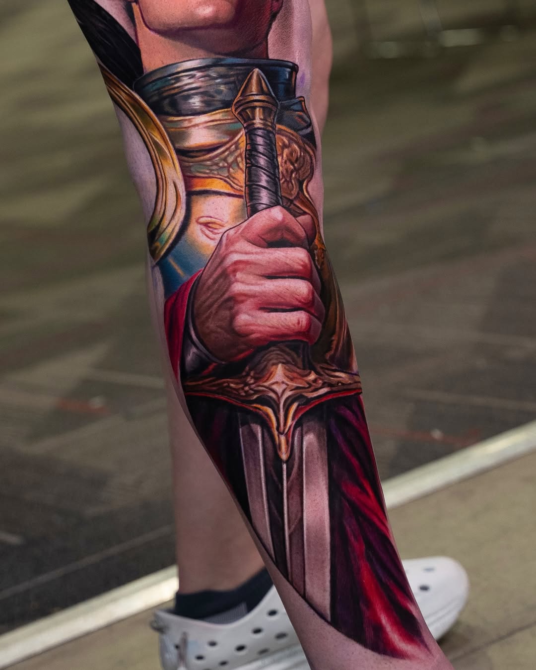 Warrior holding a sword surrealism tattoo on the forearm by @_garart_