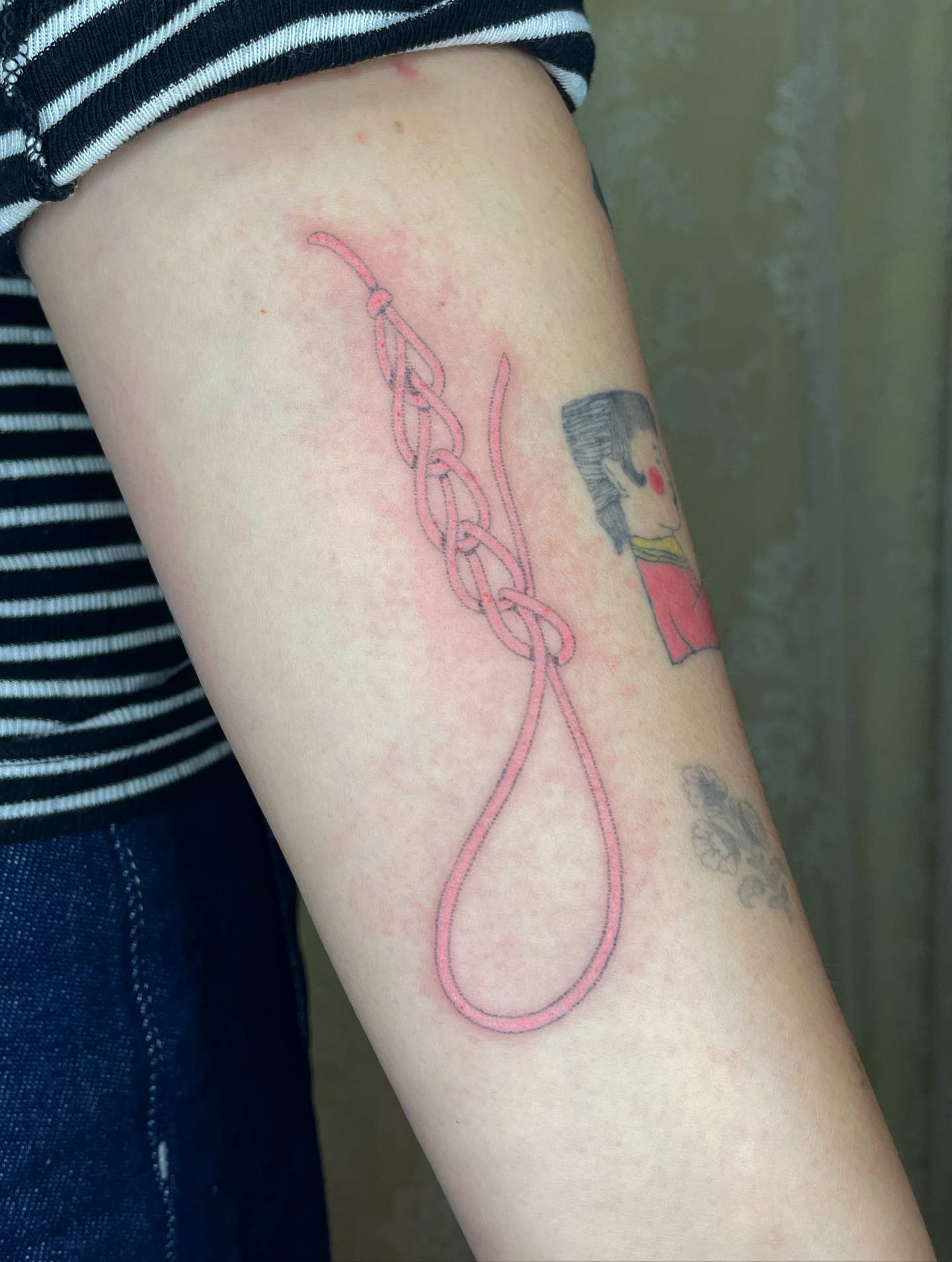 Hangman's noose American traditional tattoo on the forearm by cait