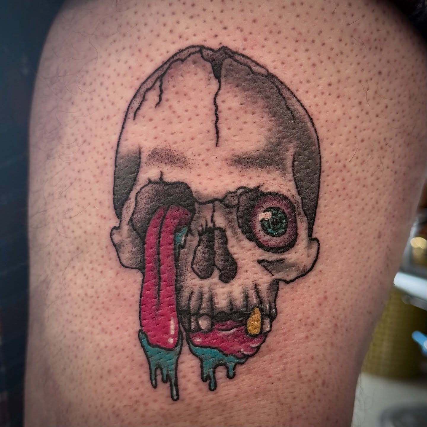 Melting skull dotwork tattoo on the thigh by Seth Christianson