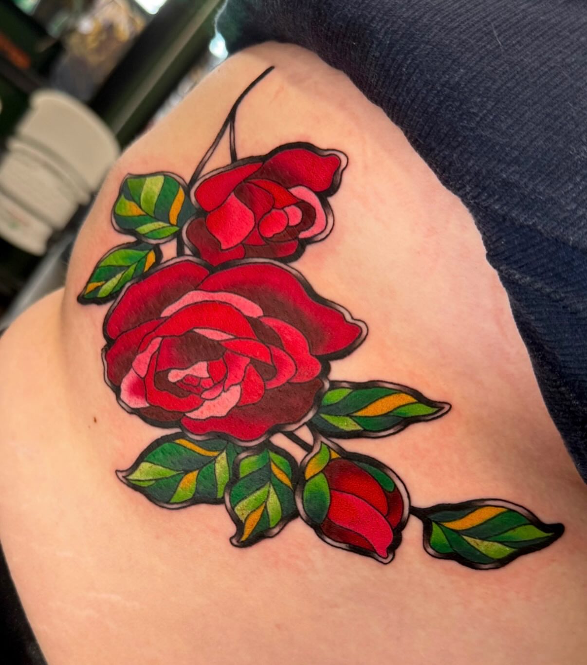 Roses American traditional tattoo on the thigh by Taylor Kay 🌿