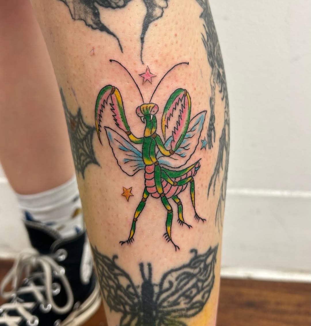 Praying mantis with wings fine line tattoo on the forearm by Chris