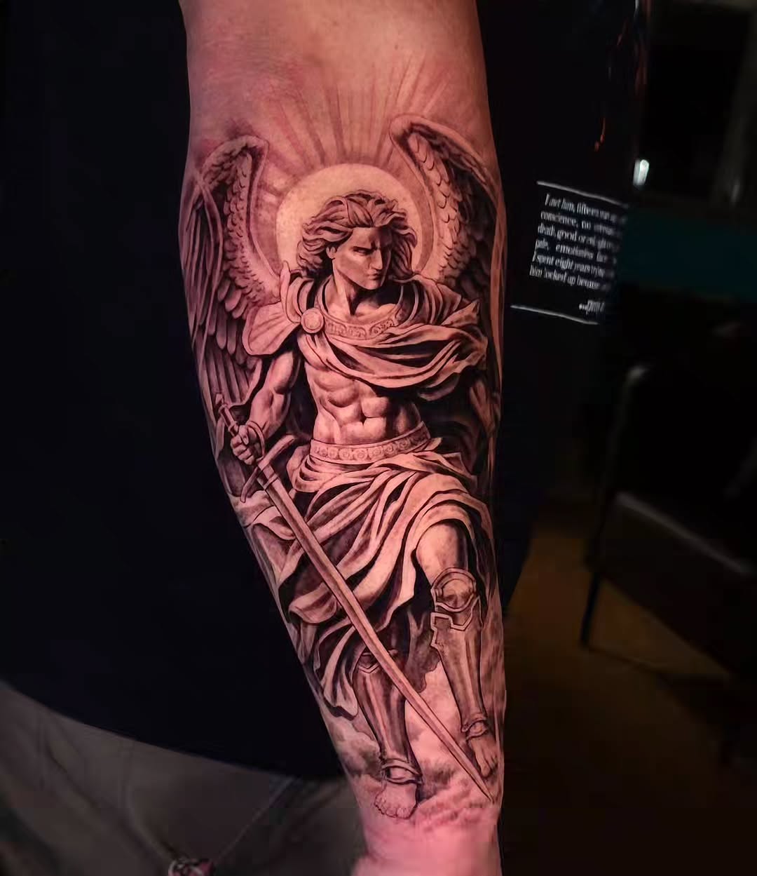 Angel with sword realism tattoo on the forearm by Brandon Rabago, Fort Worth, Texas
