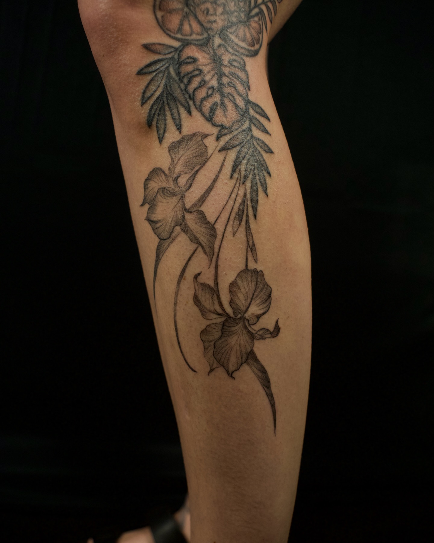Floral arrangement black and grey tattoo on the forearm by Kevin Rotramel, Dayton, Ohio